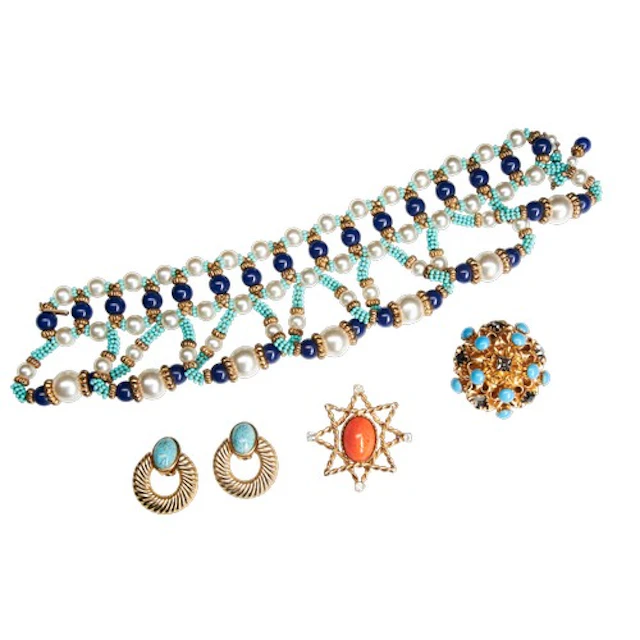 MIMI Di NISCEMI, A 1960's PASTE BROOCH, the domed brooch set...