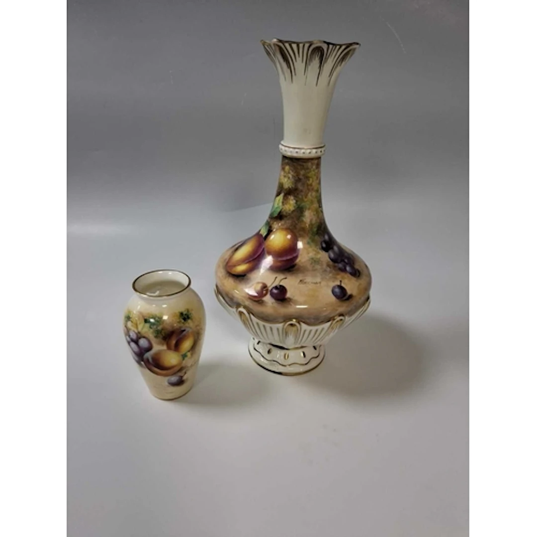 TWO VINTAGE PIECES OF ROYAL WORCESTER comprising a lamp base...