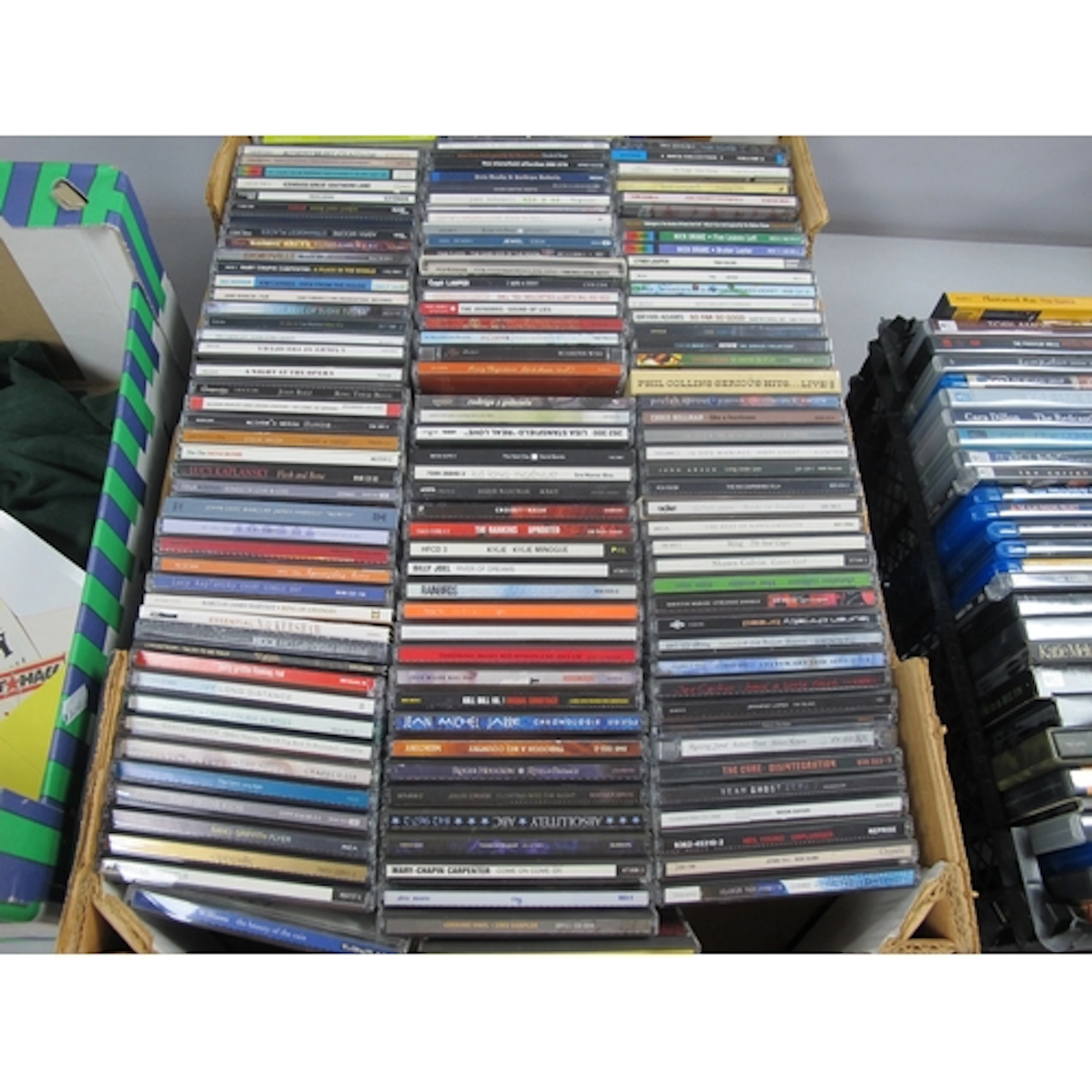 CDs, approximately 140 albums, artists include the Cure, Air...