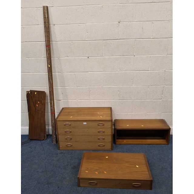 A MID-CENTURY TEAK MODULAR WALL UNIT, comprising a section w...