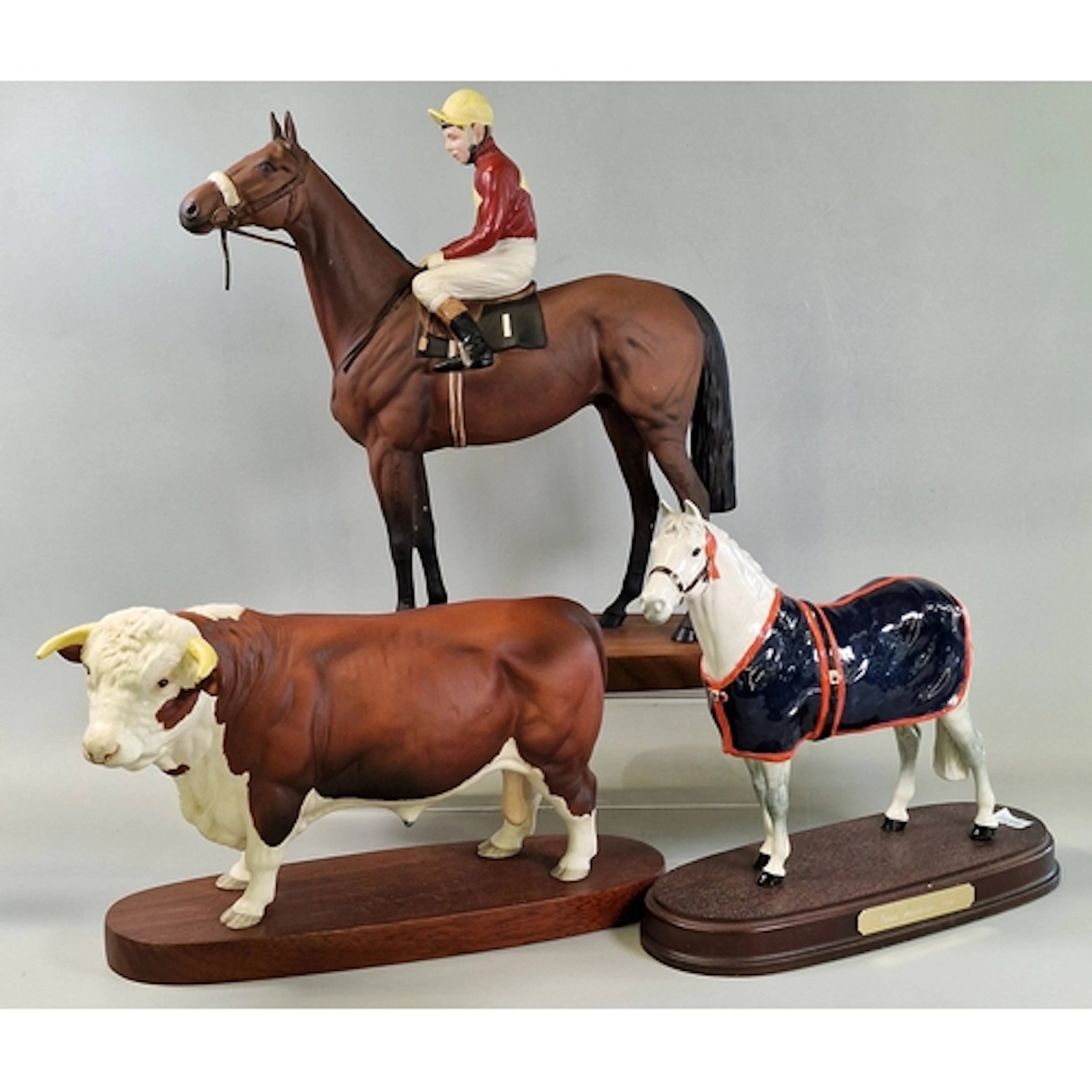 Ceramic Hereford Bull on wooden base. 18cm high approx., Roy...