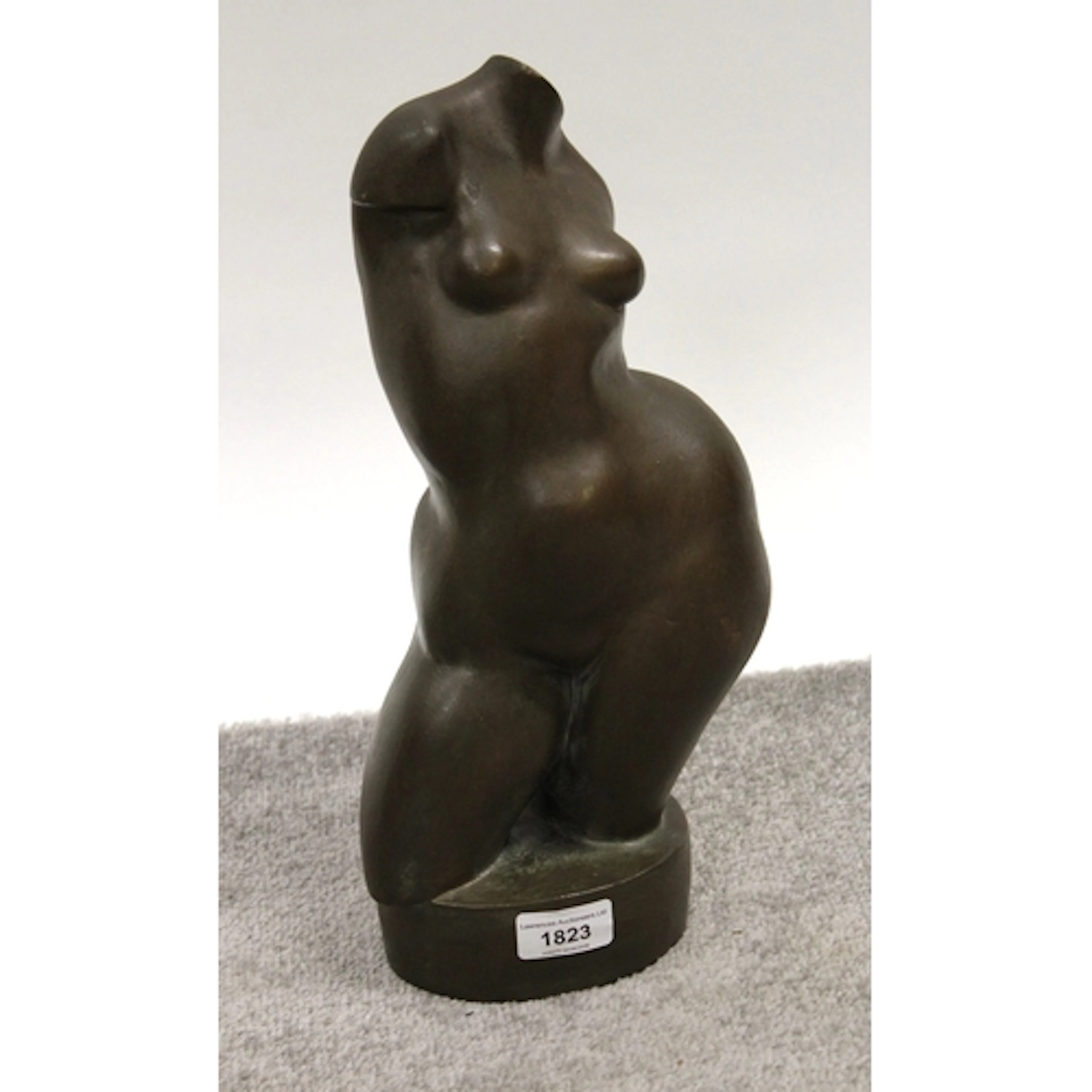 Leonard Mack, bronzed composition sculpture of a female form...