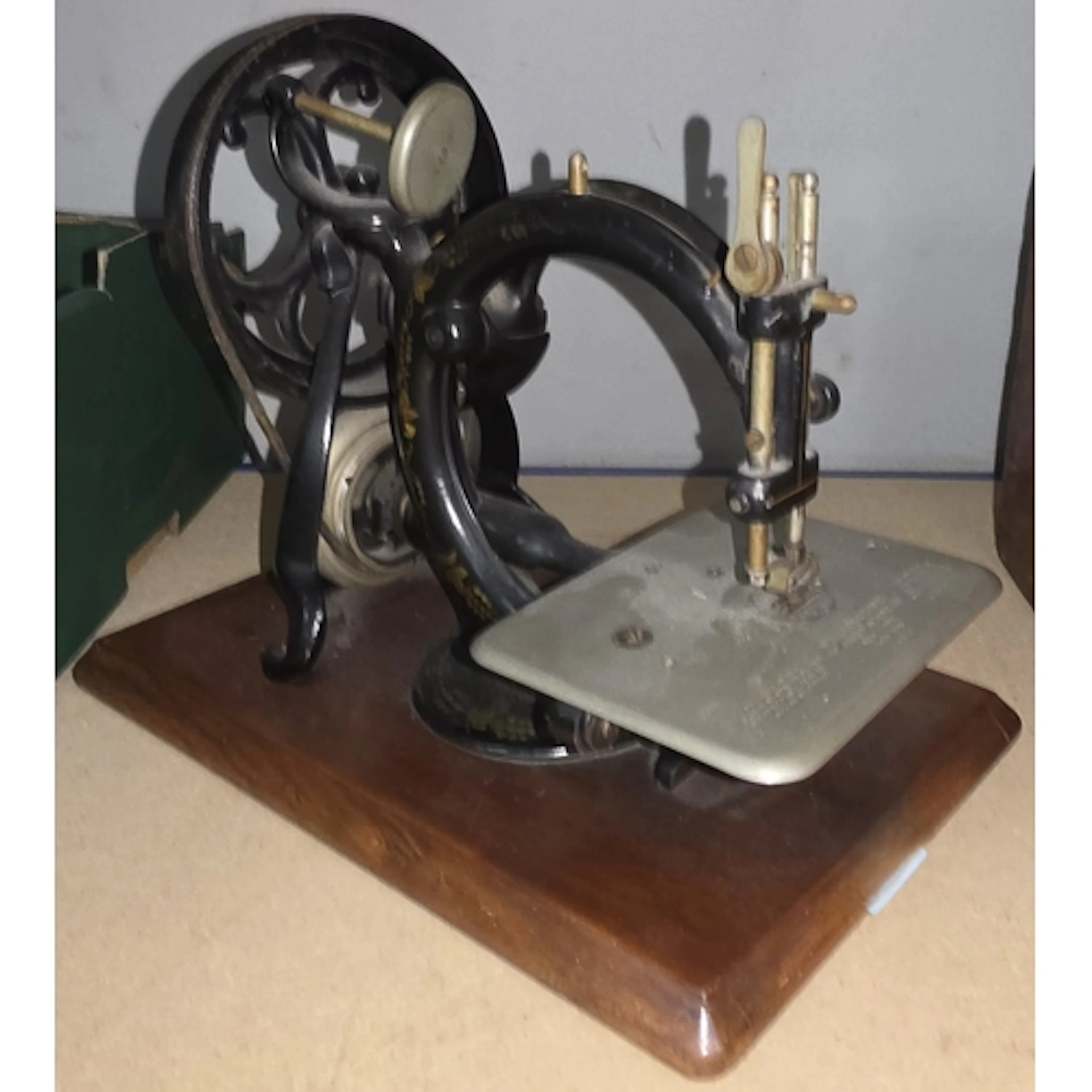 A 1900's Wilcox and Gibbs, New York, Paris, London sewing ma...