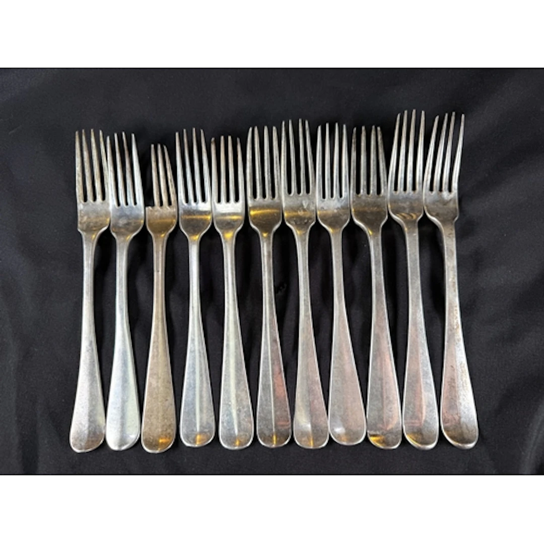 A matched set of 11 (a.f) 19th Dutch silver four pronged for...