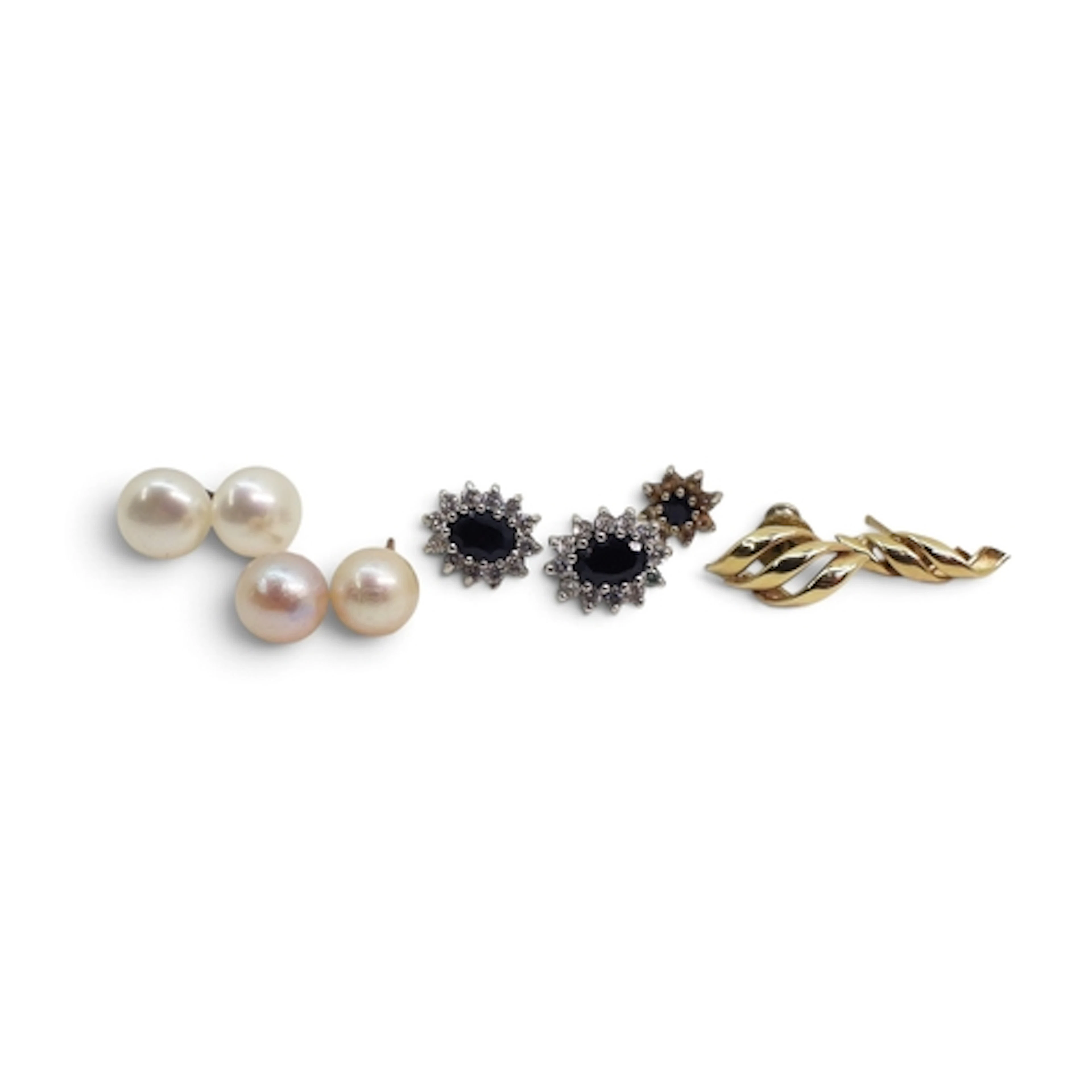 A pair of sapphire and clear gem earrings, with two further ...