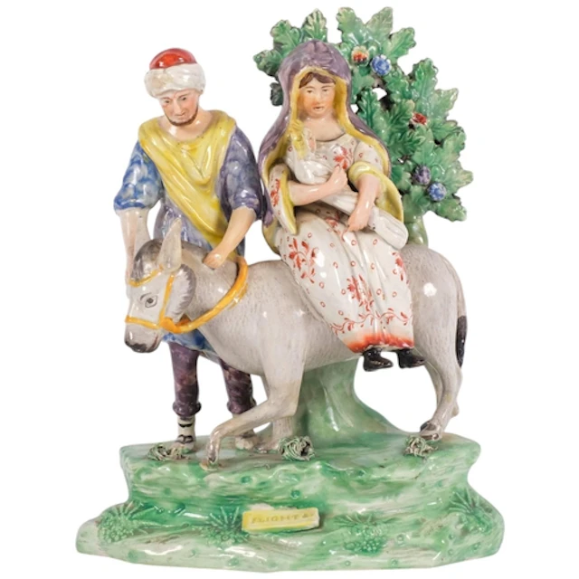 A 19th century Staffordshire pearlware group "Flight To Egyp...