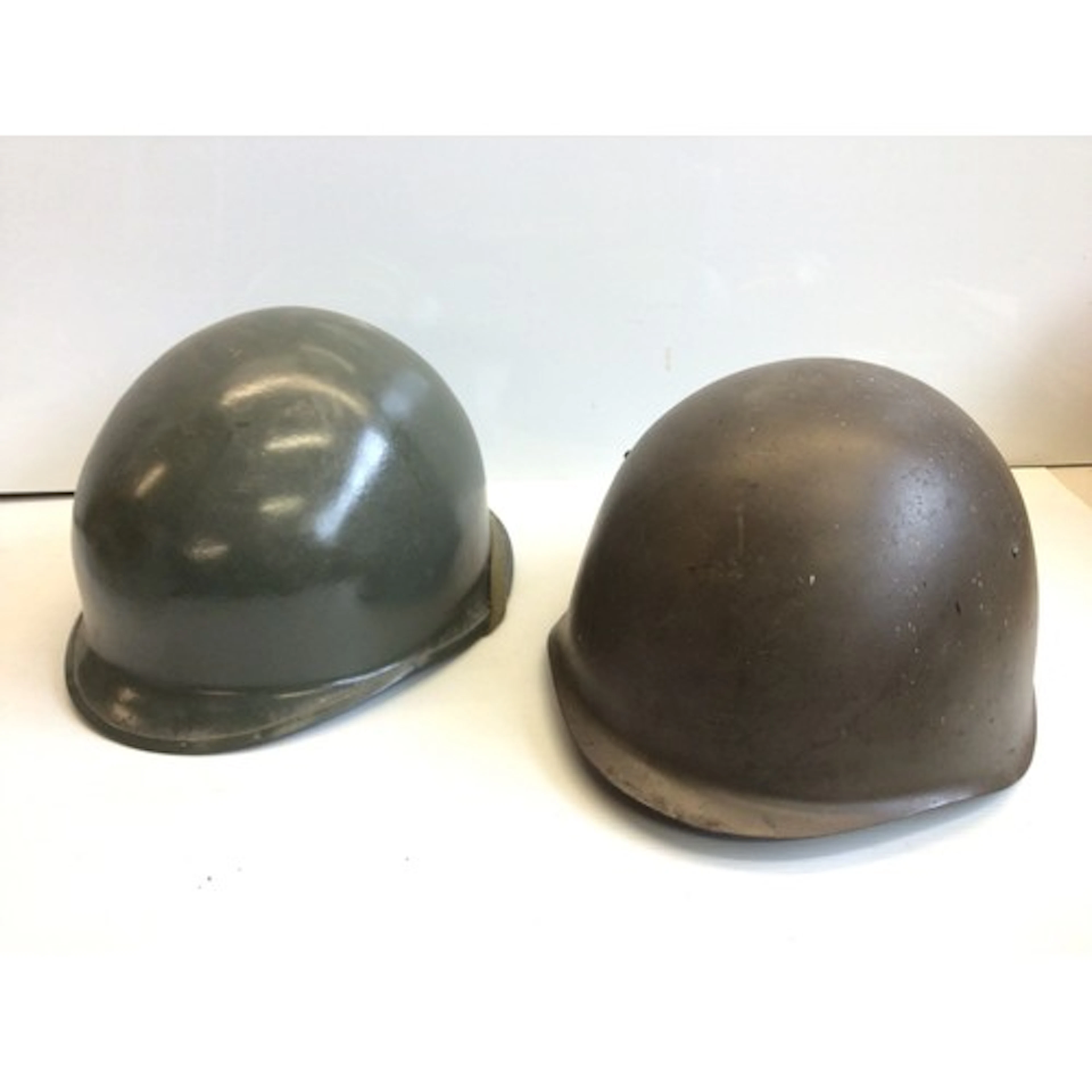 An American Vietnam period helmet and a Russian M52 helmet b...
