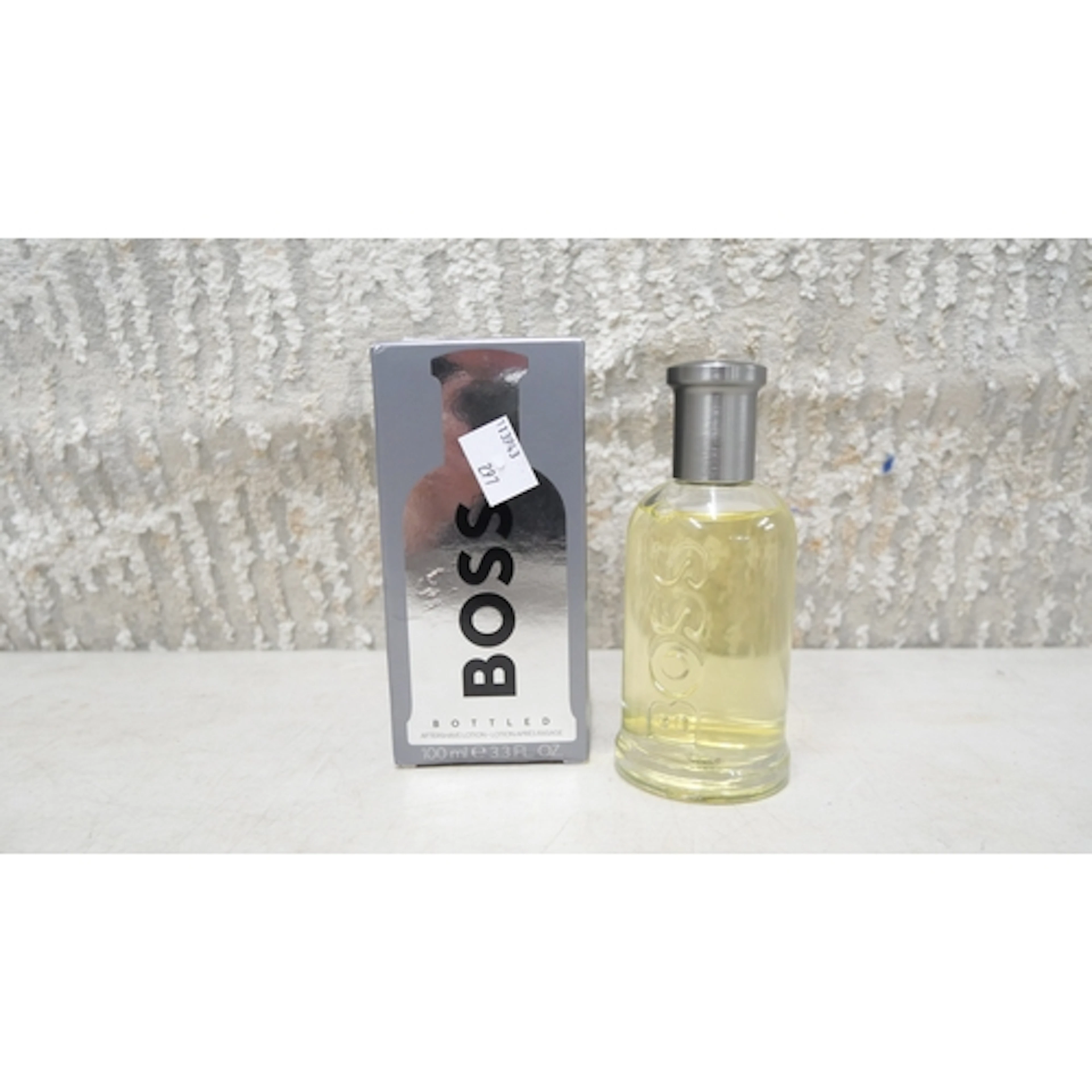 A 100ml bottle of Hugo Boss mens fragrance (395-297) *This l...