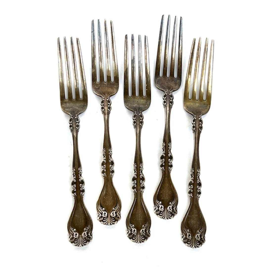 A lot of five sterling silver table forks, 277g