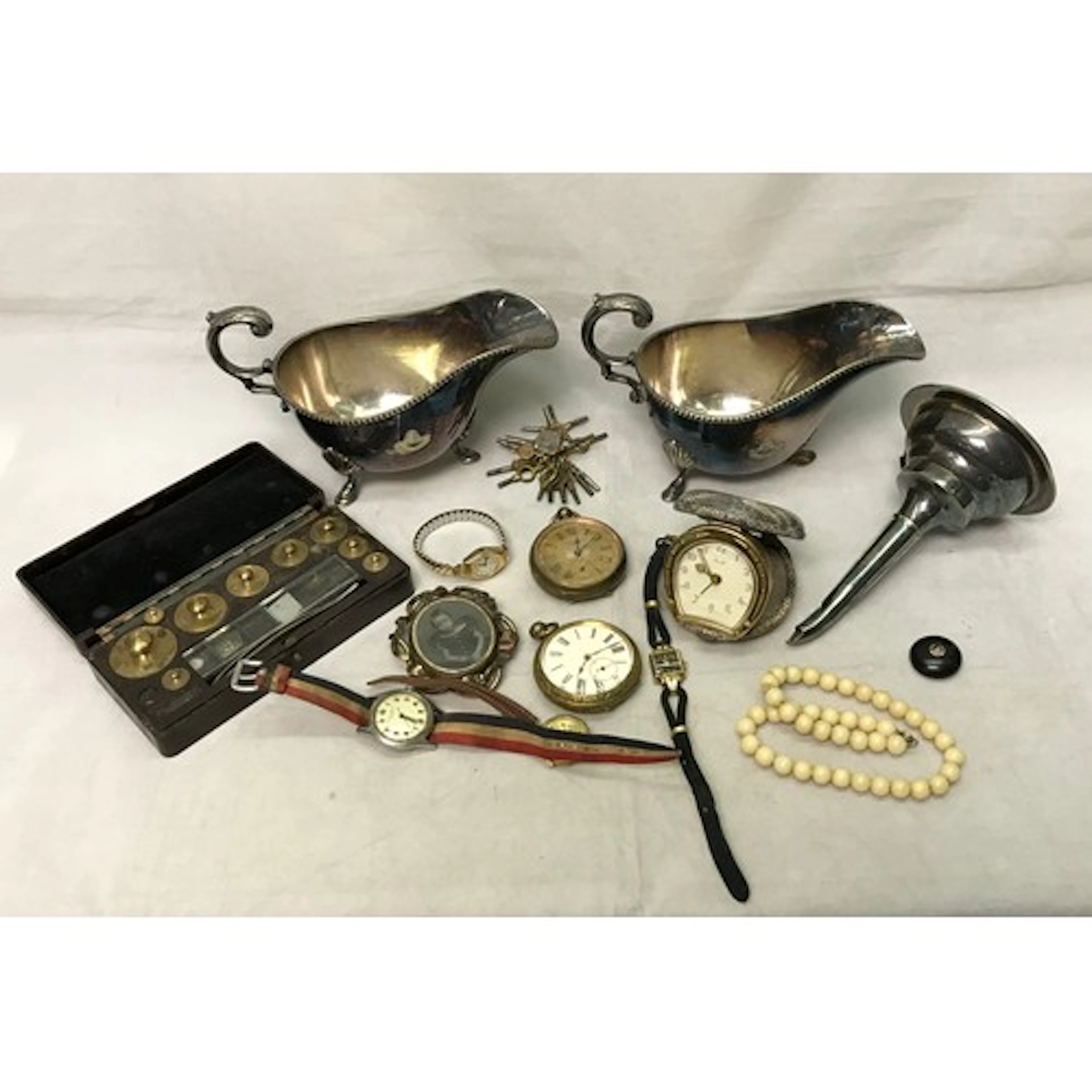 Two base metal cased pocket watches; a Baume et Mercier Gene...