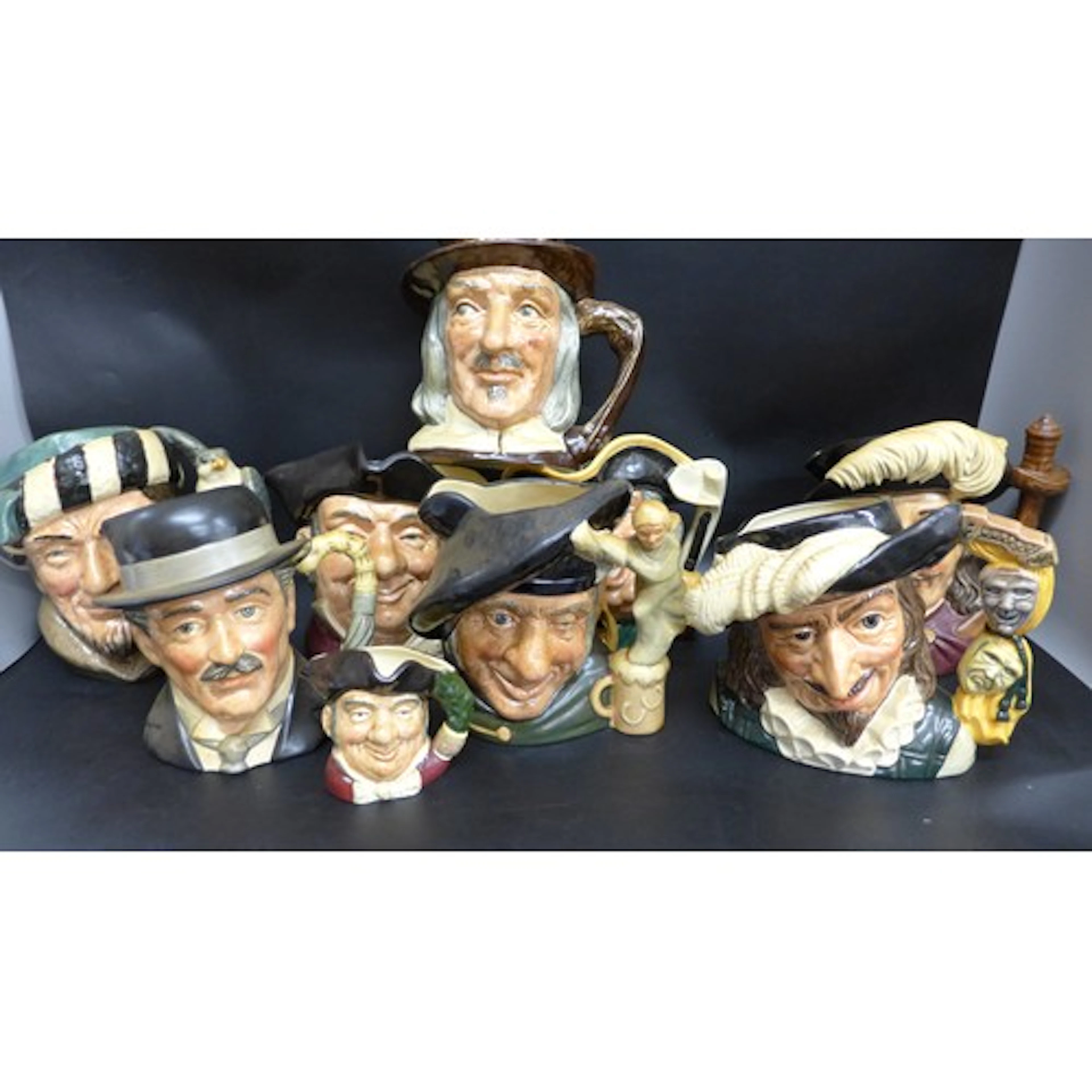 Eight Royal Doulton character jugs including Mine host, City...