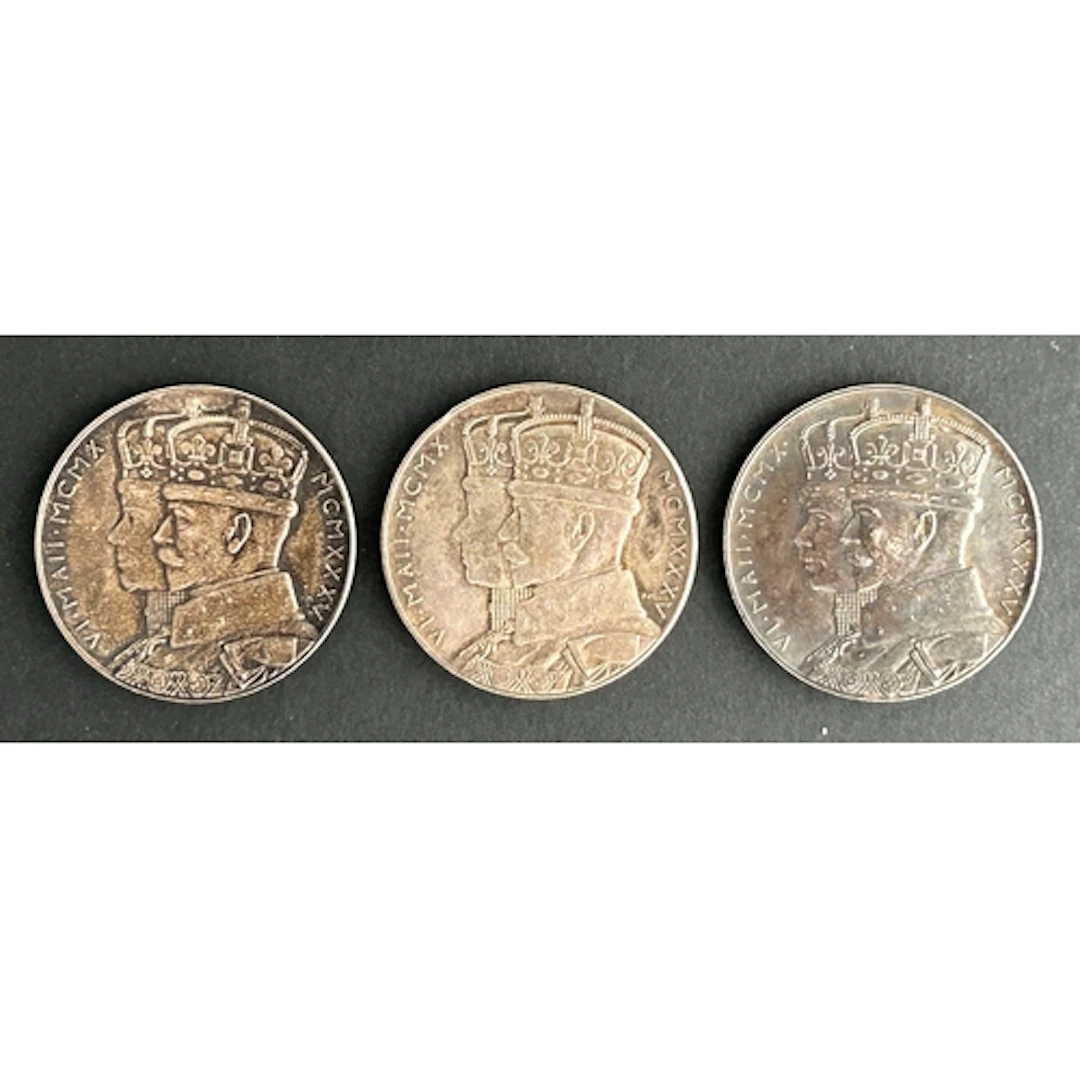 A group of three official Royal Mint George V Silver Jubilee...