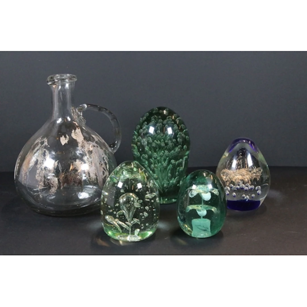 Group of four antique blown glass dumps, three green example...