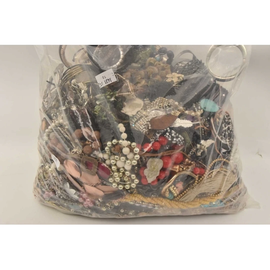 A LARGE BAG OF COSTUME JEWELLERY, spares, repairs, odd parts...