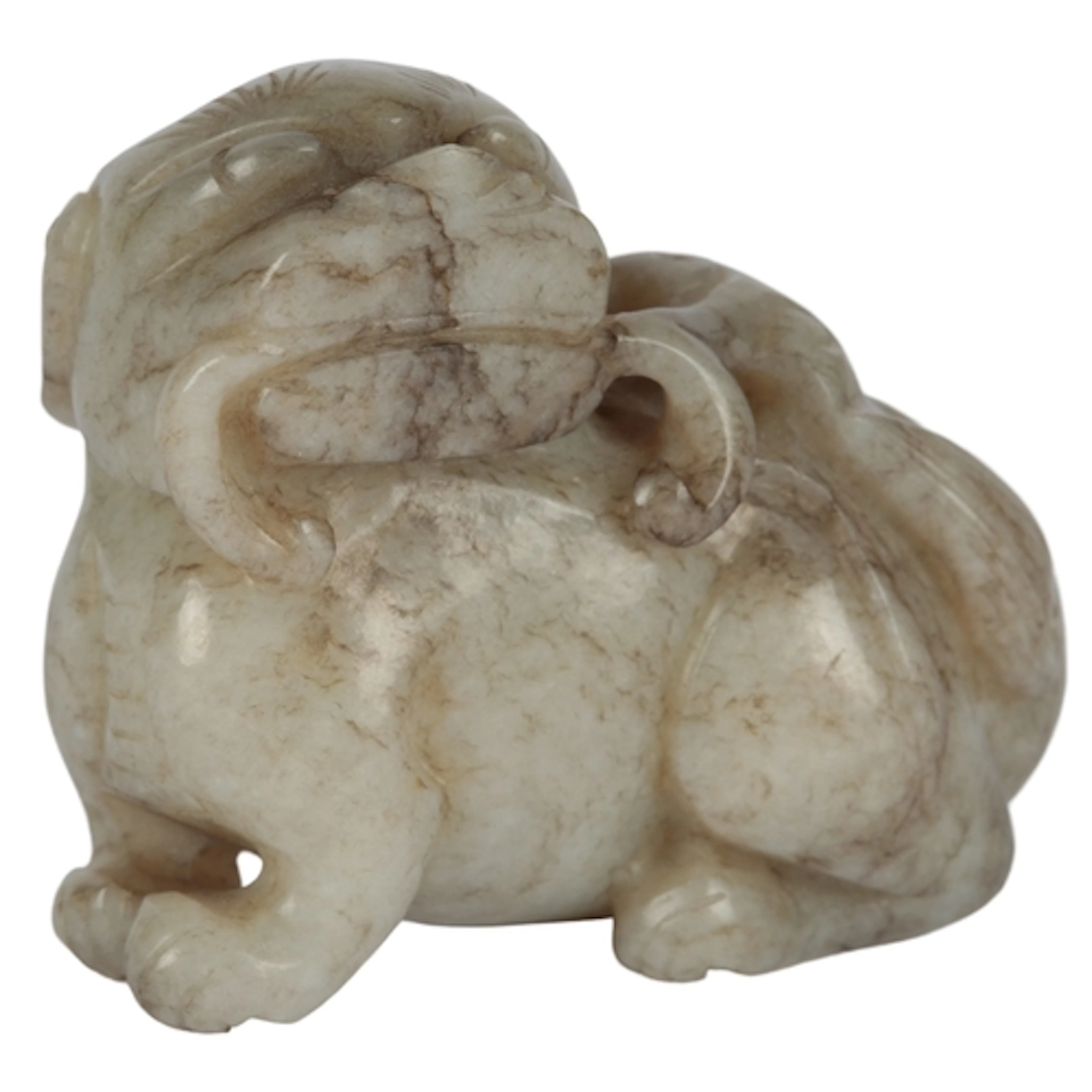 A Chinese white and grey jade carving of a lion-dog, 17th/18...