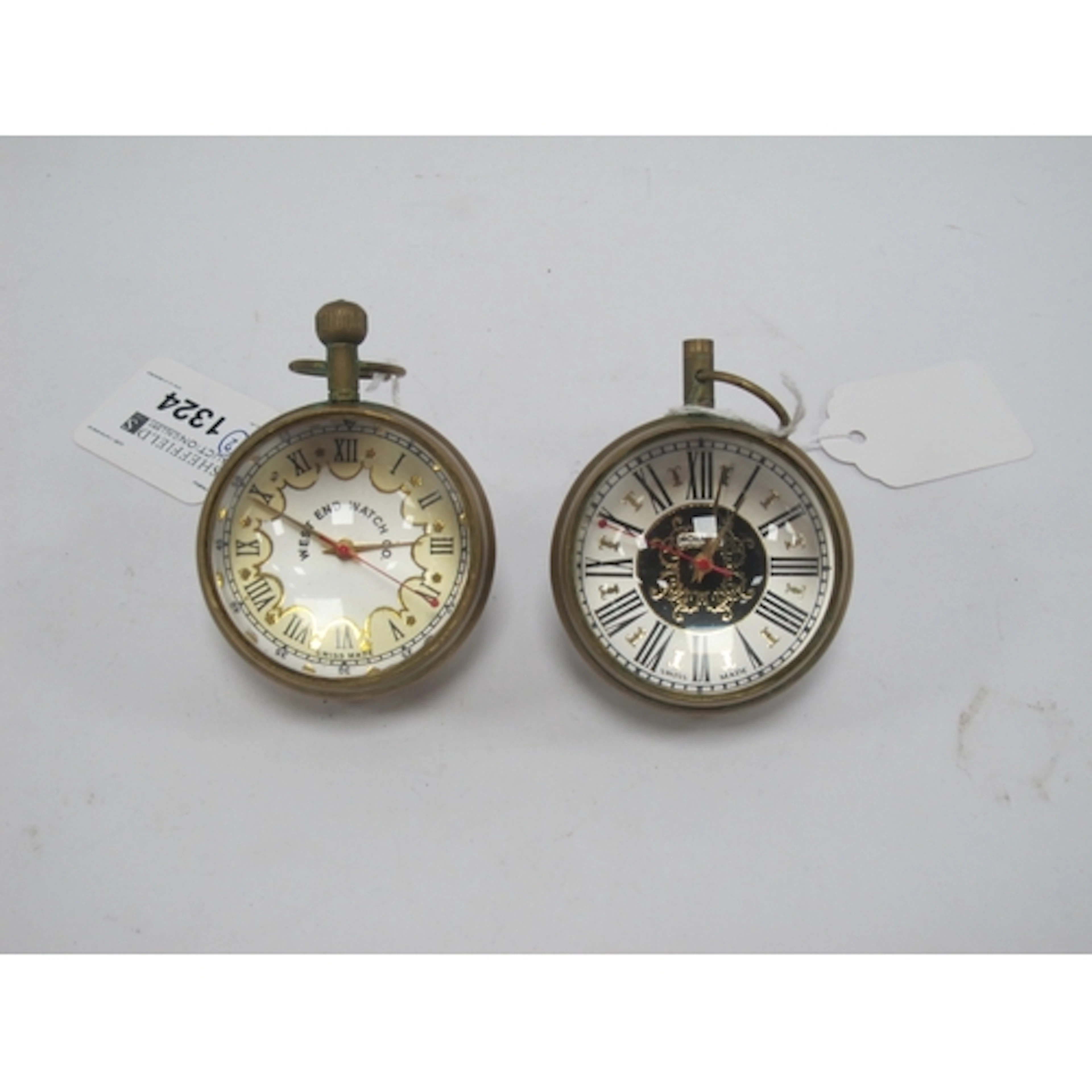 West End Watch Co, glass and brass ball clock, approx 5cm di...