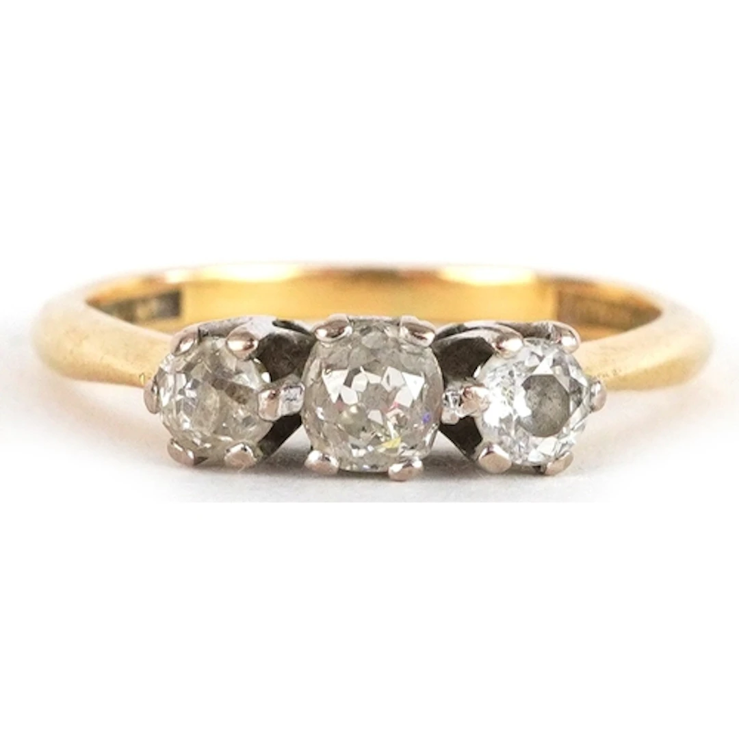 18ct gold and platinum diamond three stone ring, size L/M, 3...