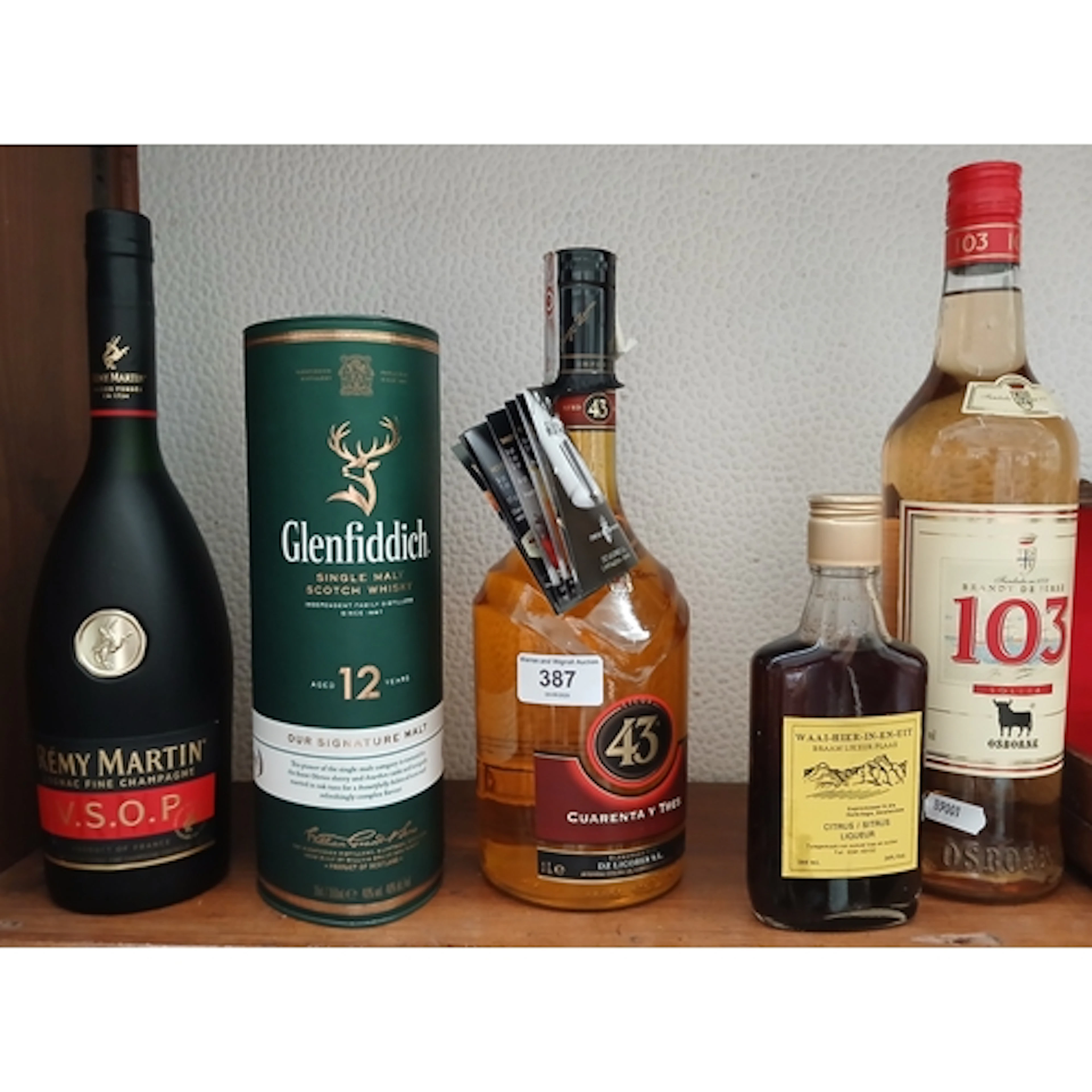 5 bottles of alcohol including Remy Martin VSOP, half bottle...