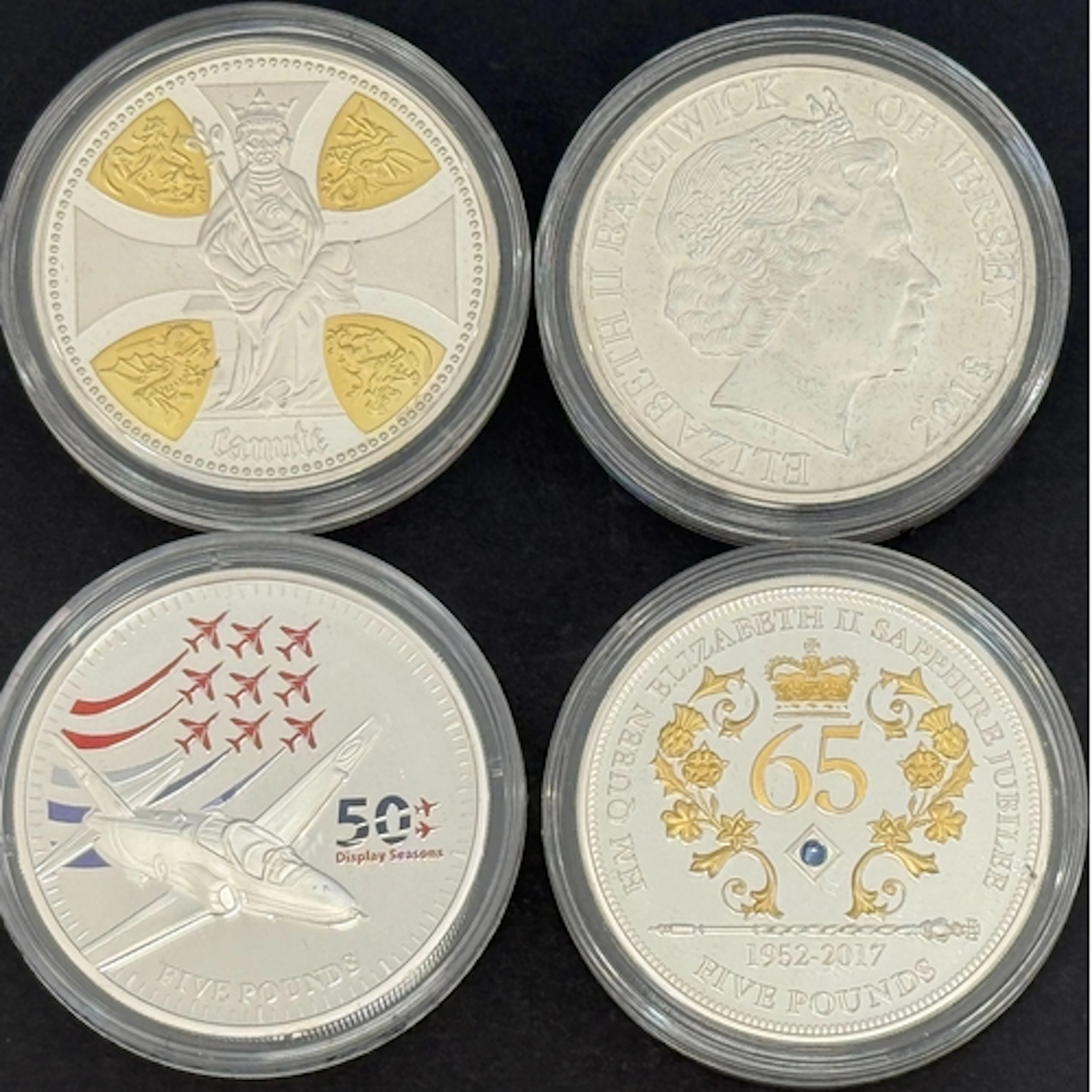 A group of four Jersey silver proof £5 coins, comprising 201...