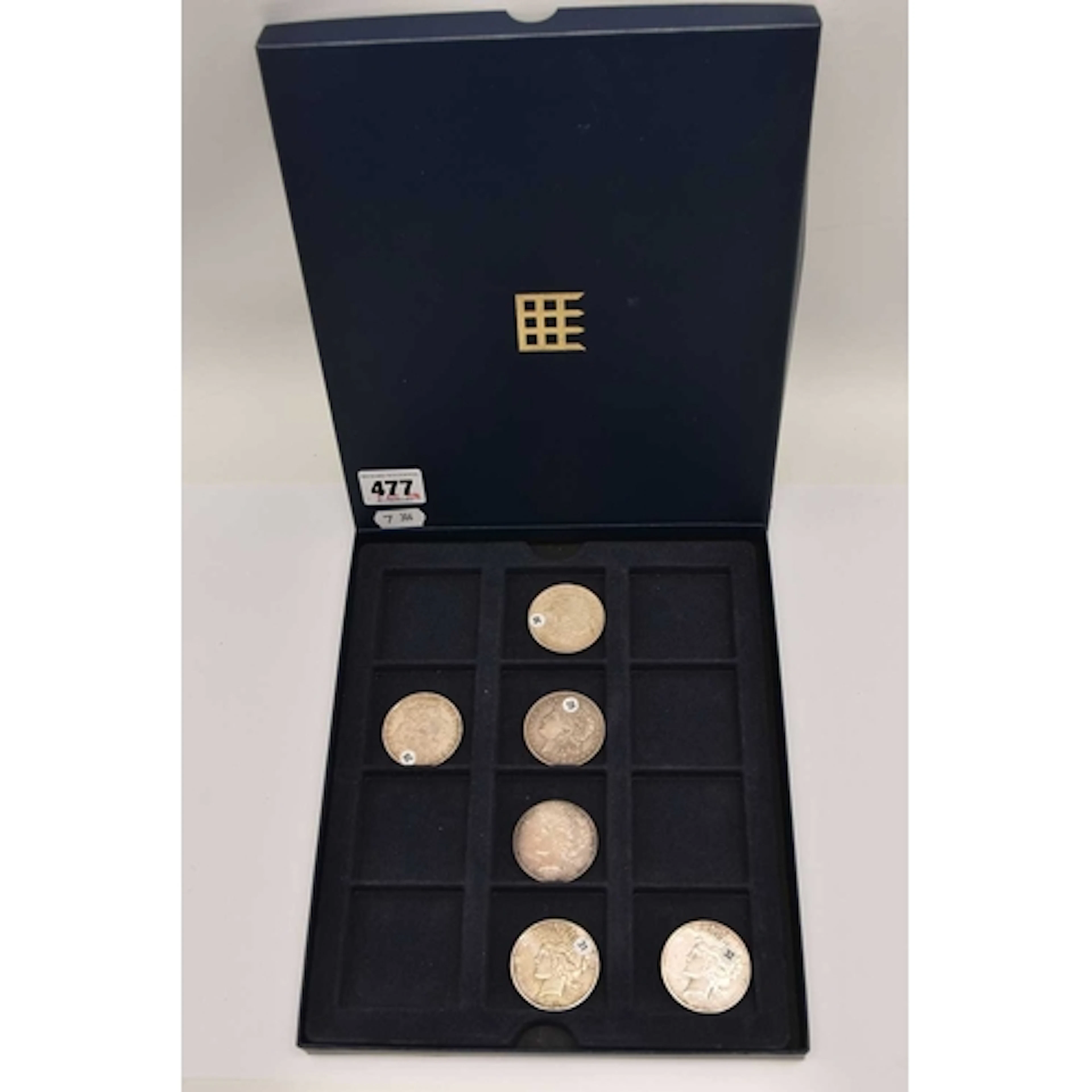 A box containing Six USA One Dollar Coins Dated 1883 higher ...