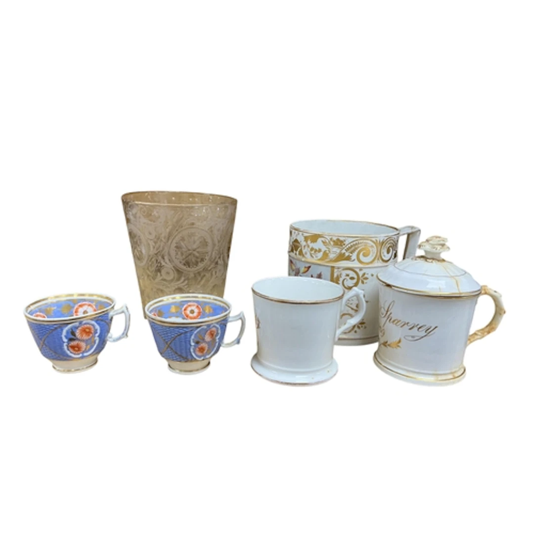 A Derby fruit painted tankard, along with two pieces of date...