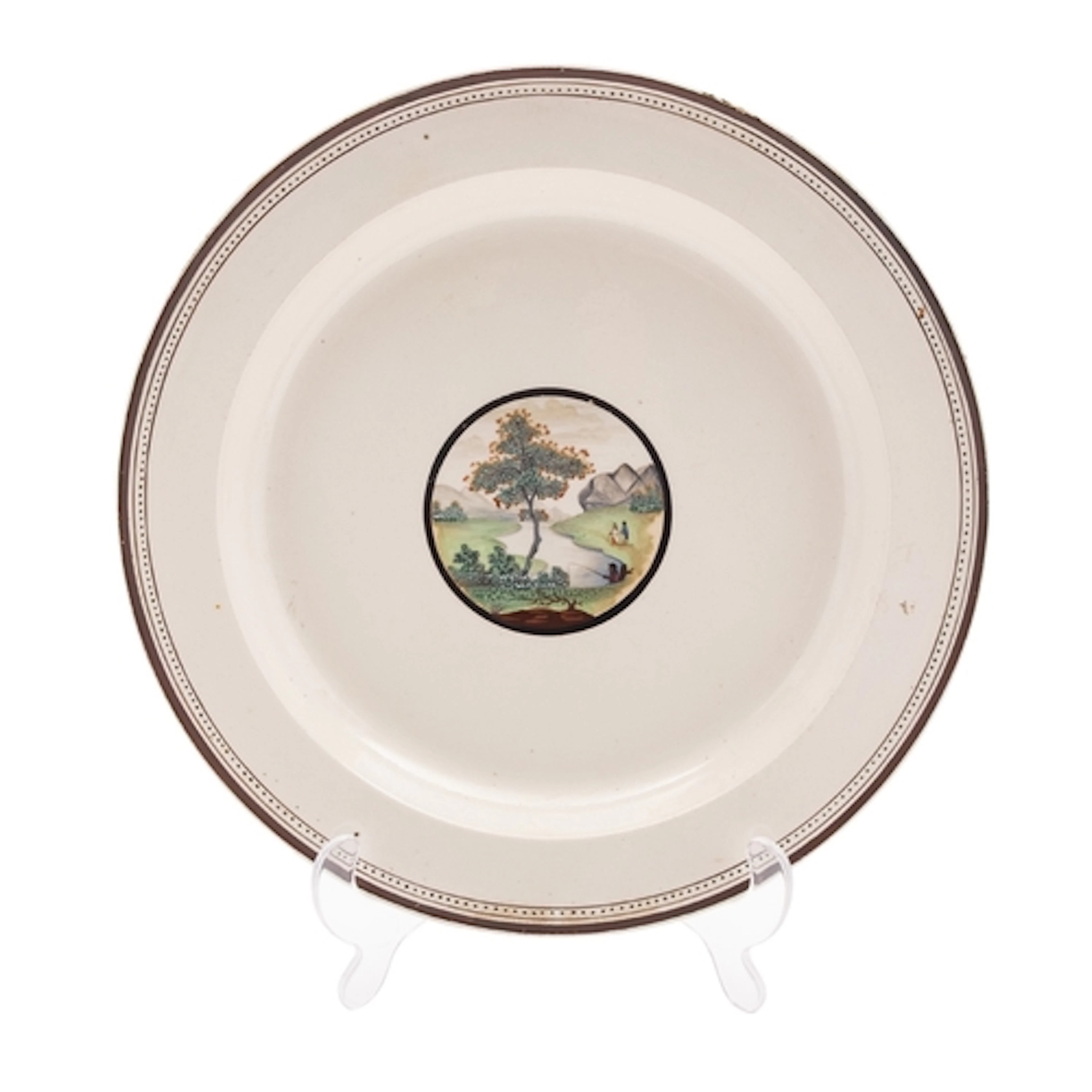 A large creamware serving dish, circa 1800 the centre painte...