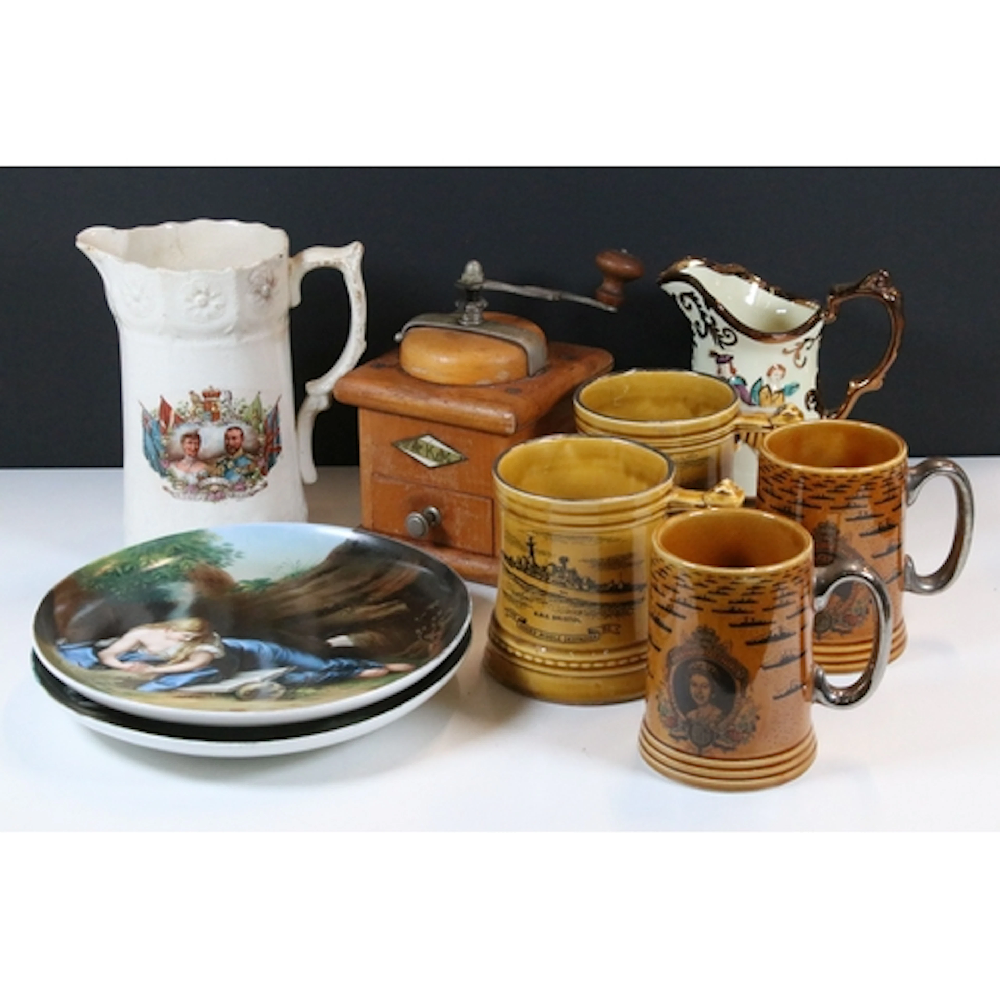 Group of four commemorative ceramic tankards, to comprise Lo...