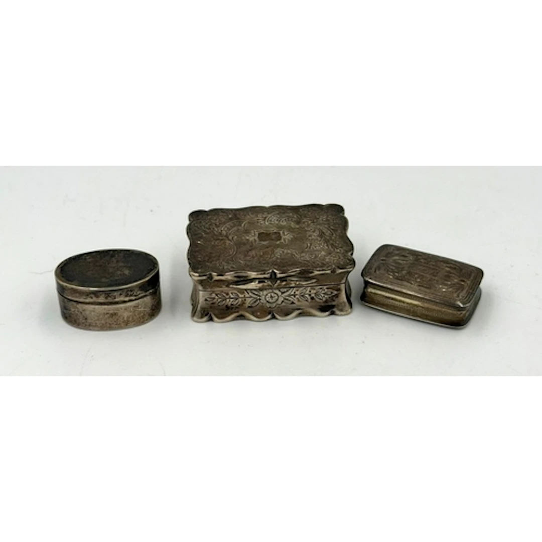 Hallmarked silver snuff box and two silver vinaigrettes, var...