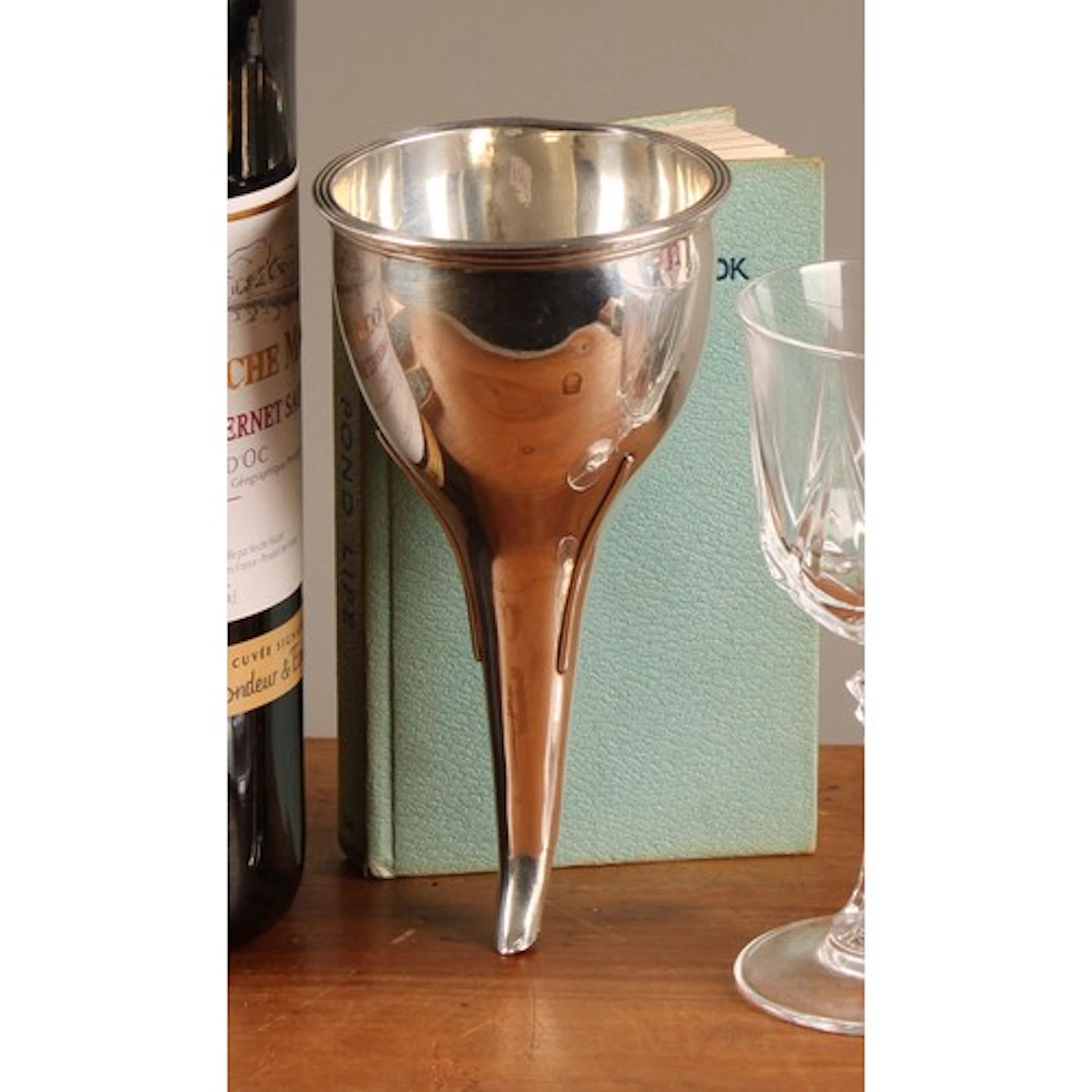 A George III Irish silver wine funnel, reeded rim, 16cm long...