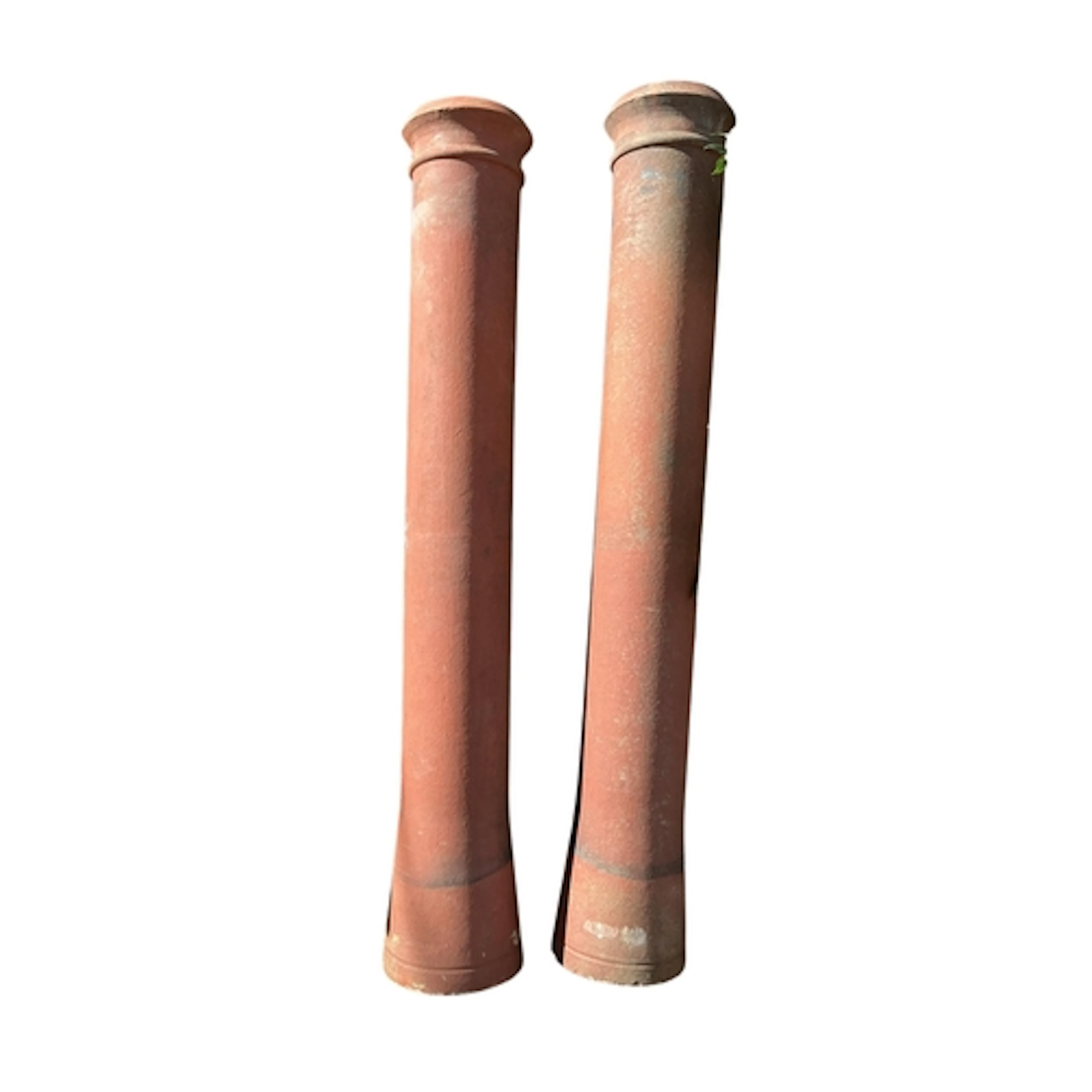 Two tall terracotta chimney pots, height 181cm