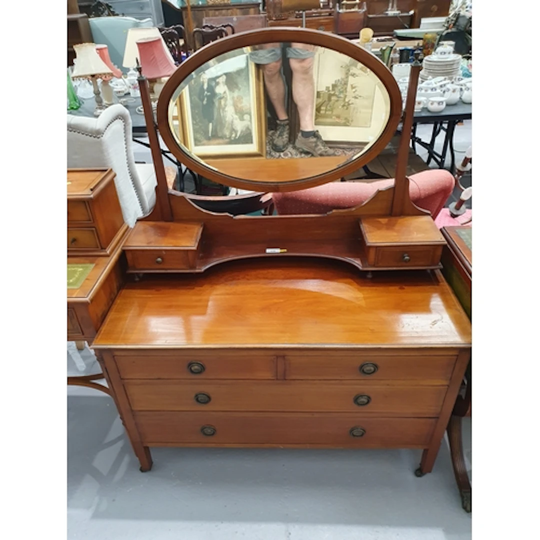 A mahogany dressing Table with mirror back fitted six drawer...