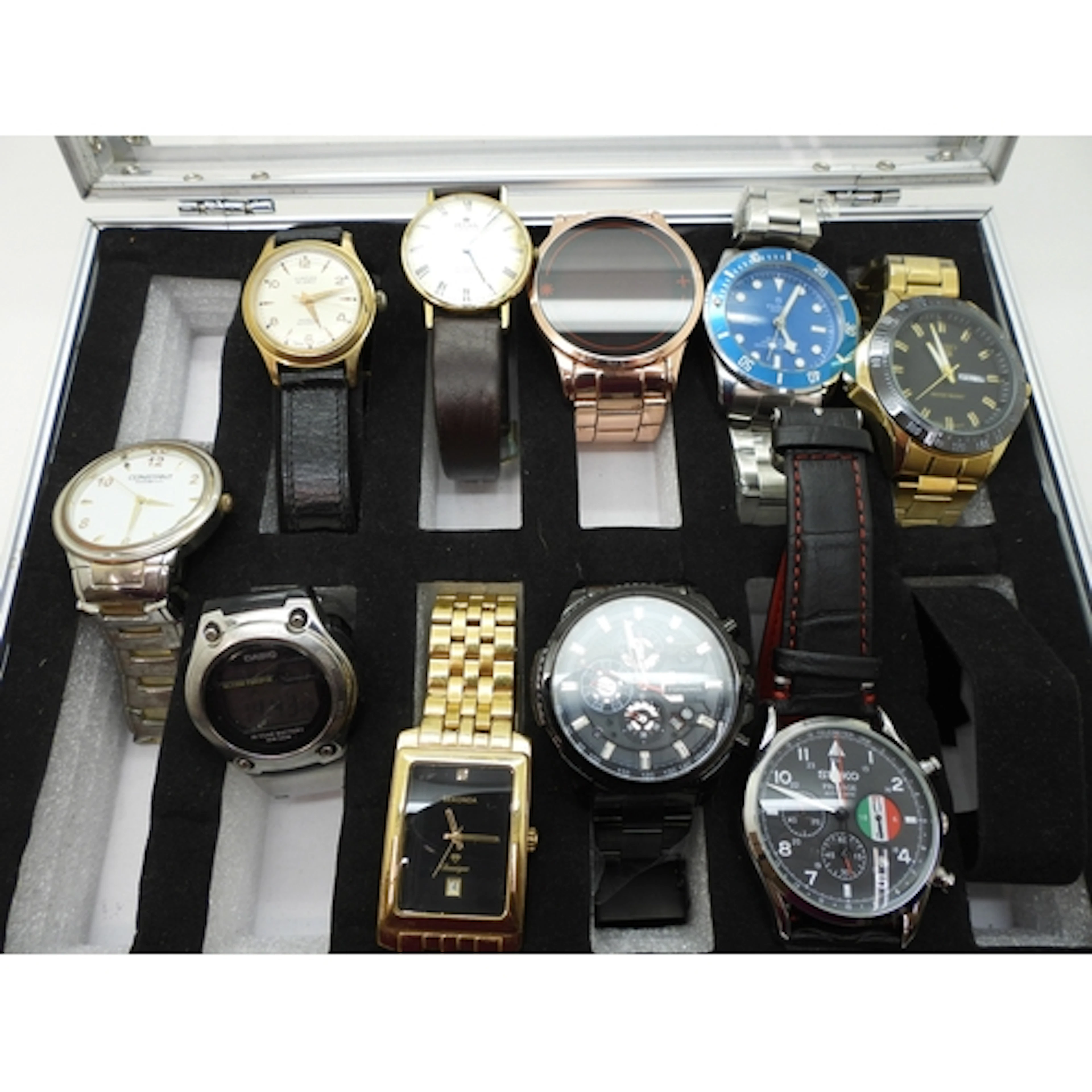 A collection of fashion watches to include a black watch by ...