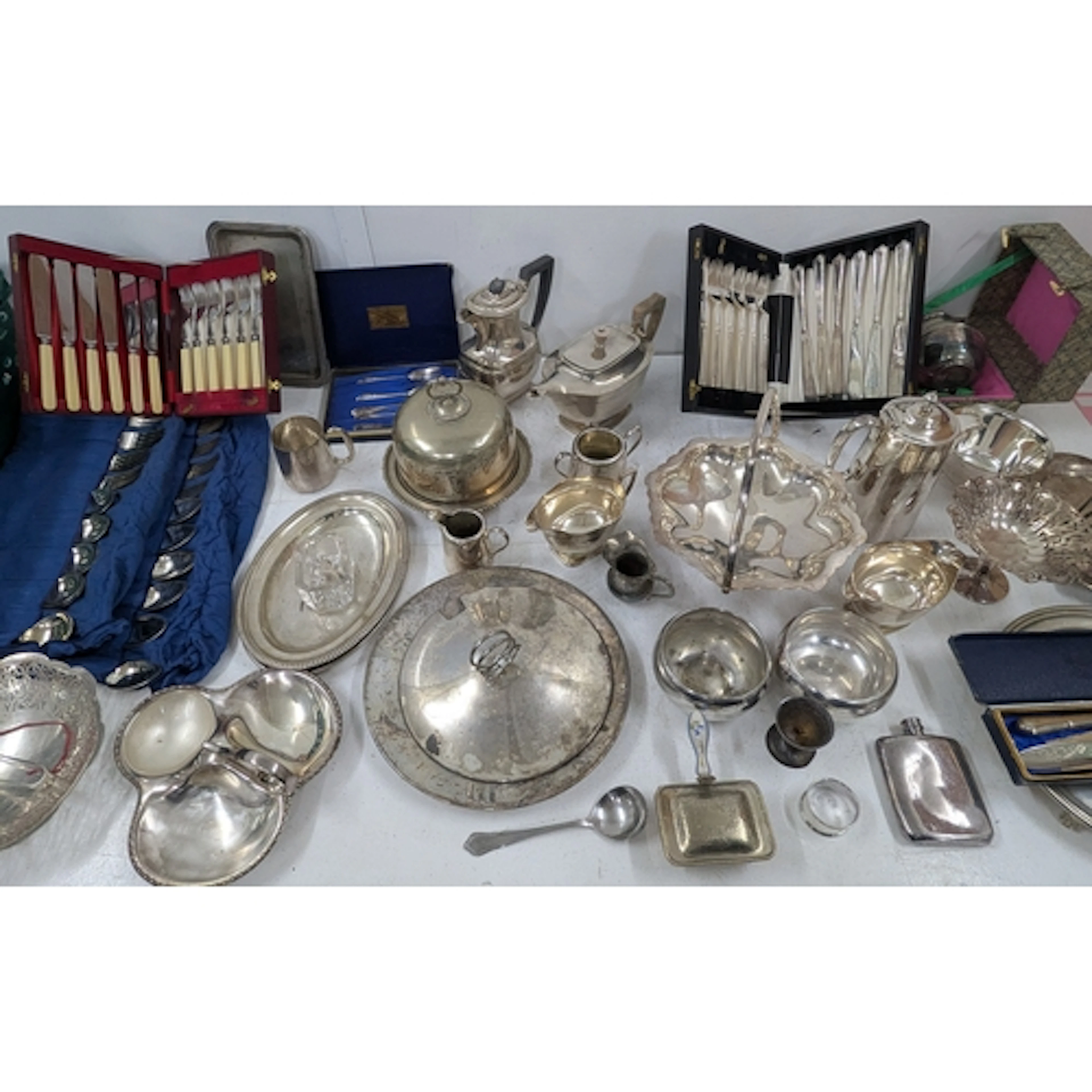 A mixed selection of silver plated tableware to include case...