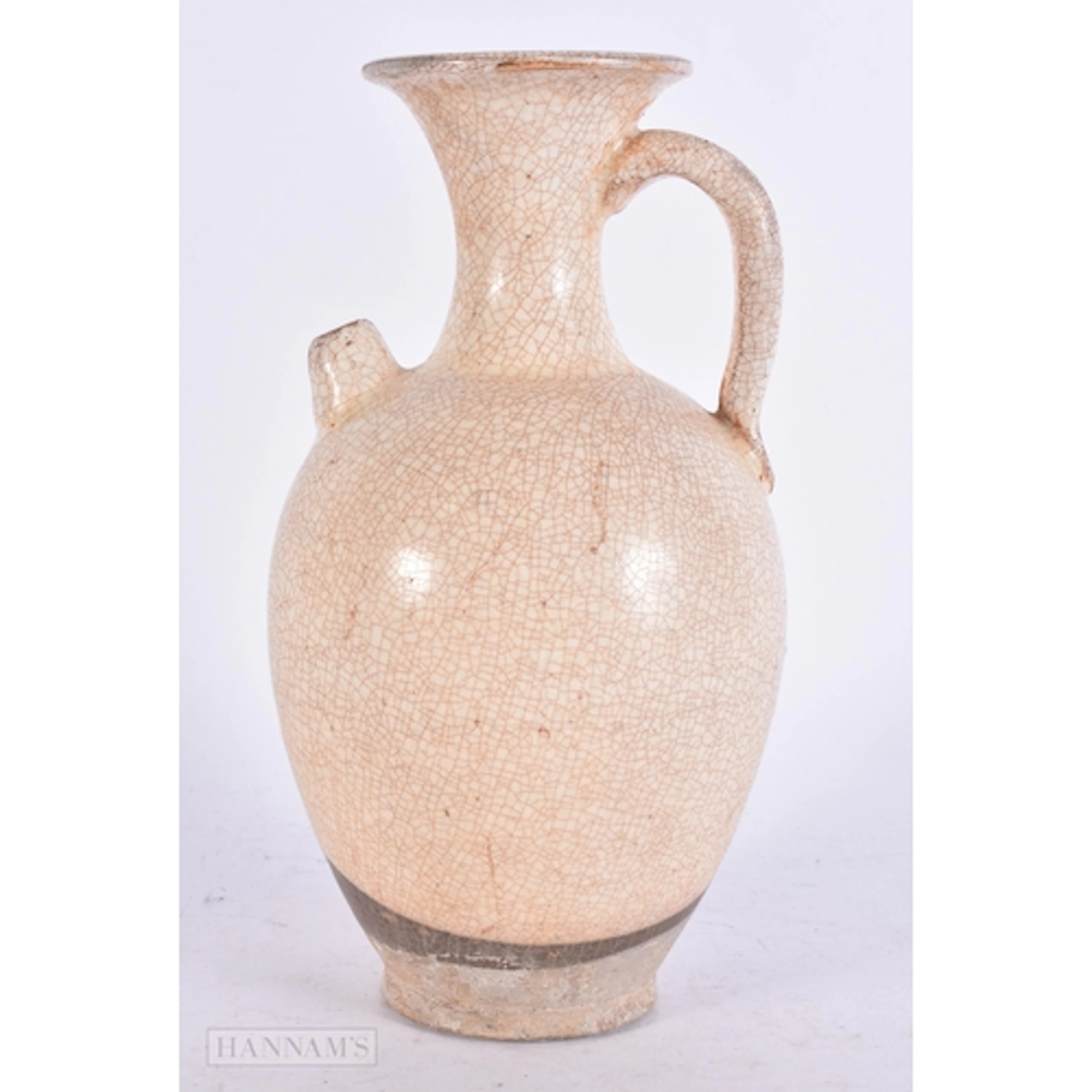 A CHINESE WHITE AND BROWN BANDED POTTERY KENDI EWER Song/Yua...