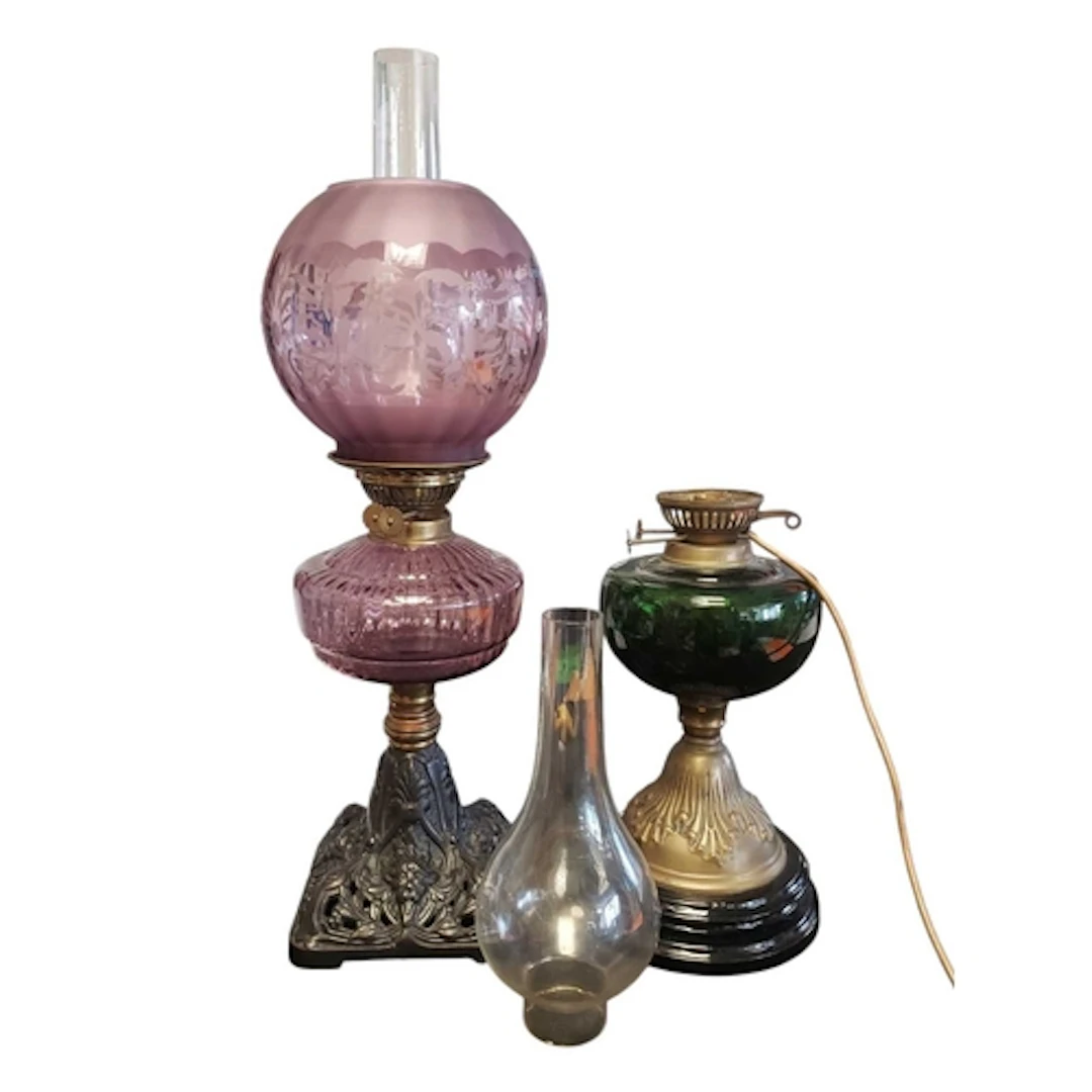Two early 20th century converted oil lamps. One featuring a ...