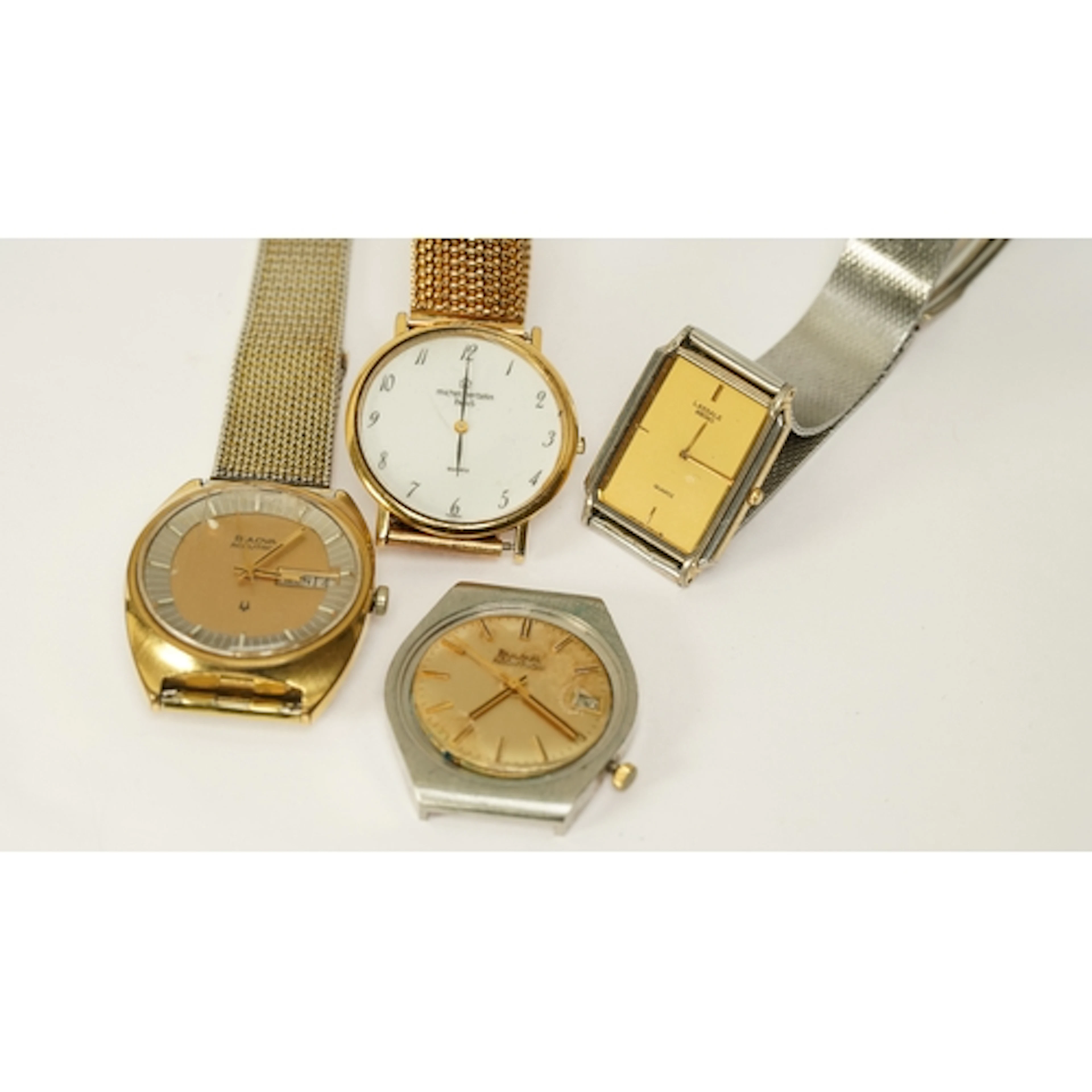 Collection of four quartz and tuning fork watches, including...
