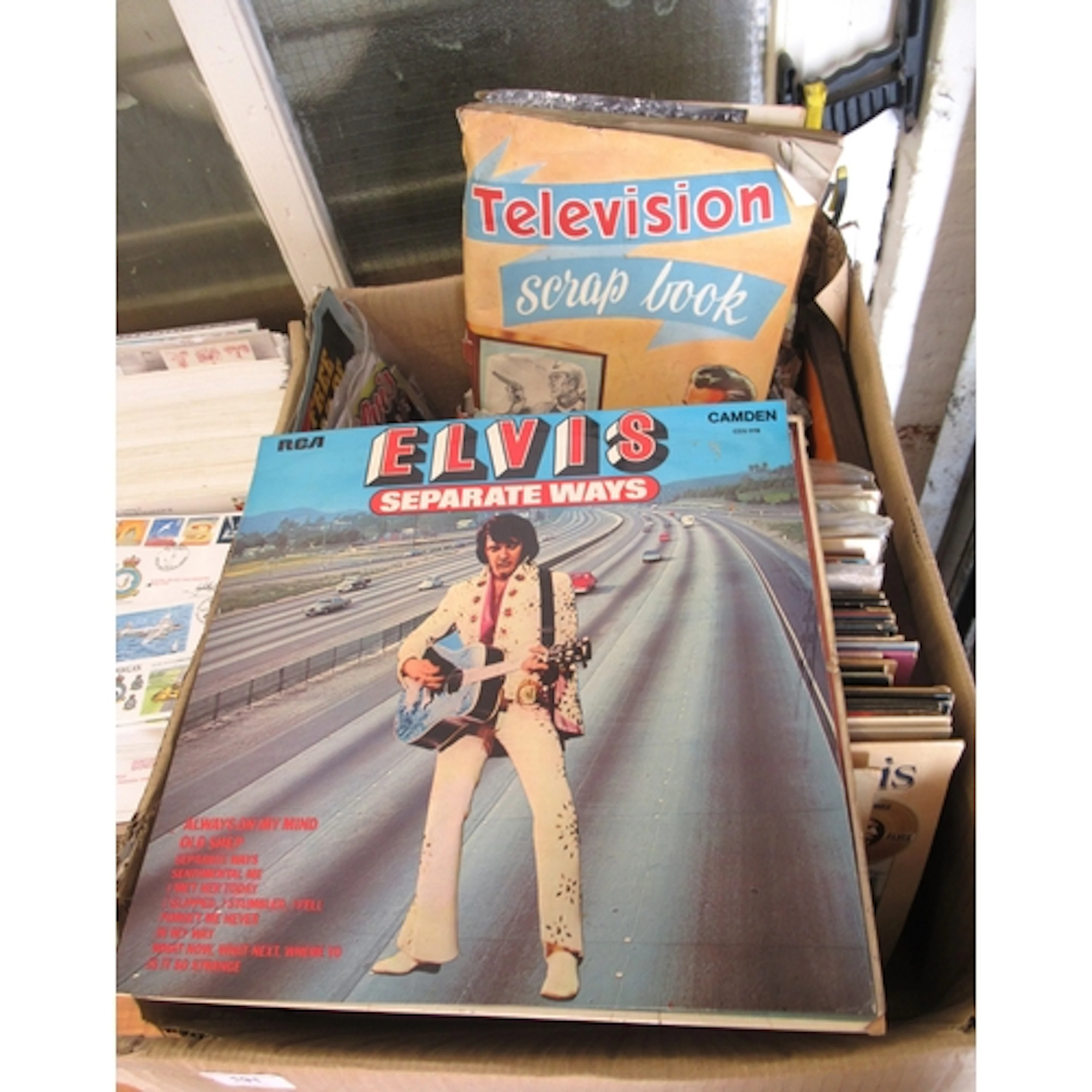 Quantity of Elvis records, together with a small quantity of...