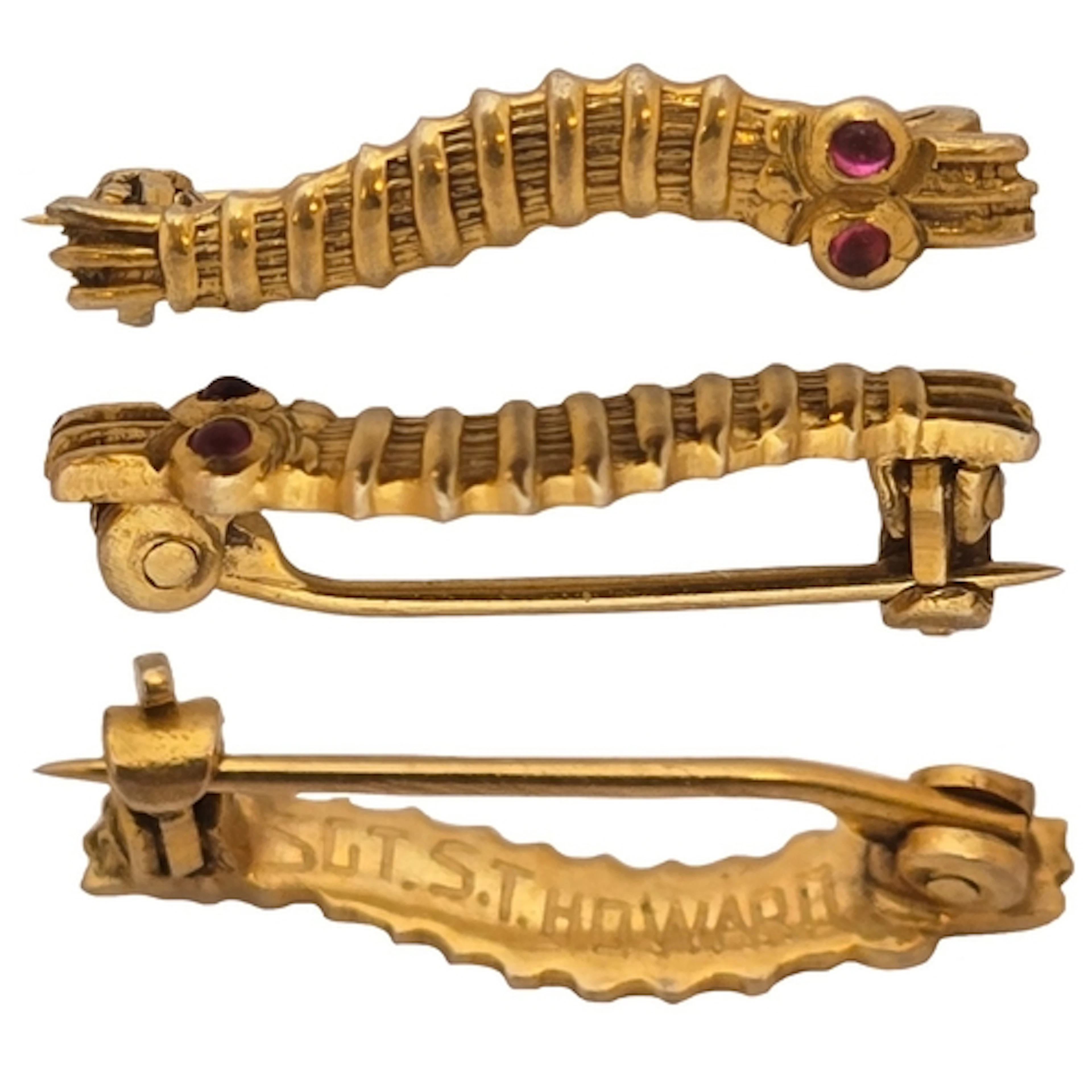 Howard Family group: 1. Caterpillar Club badge, in gold with...
