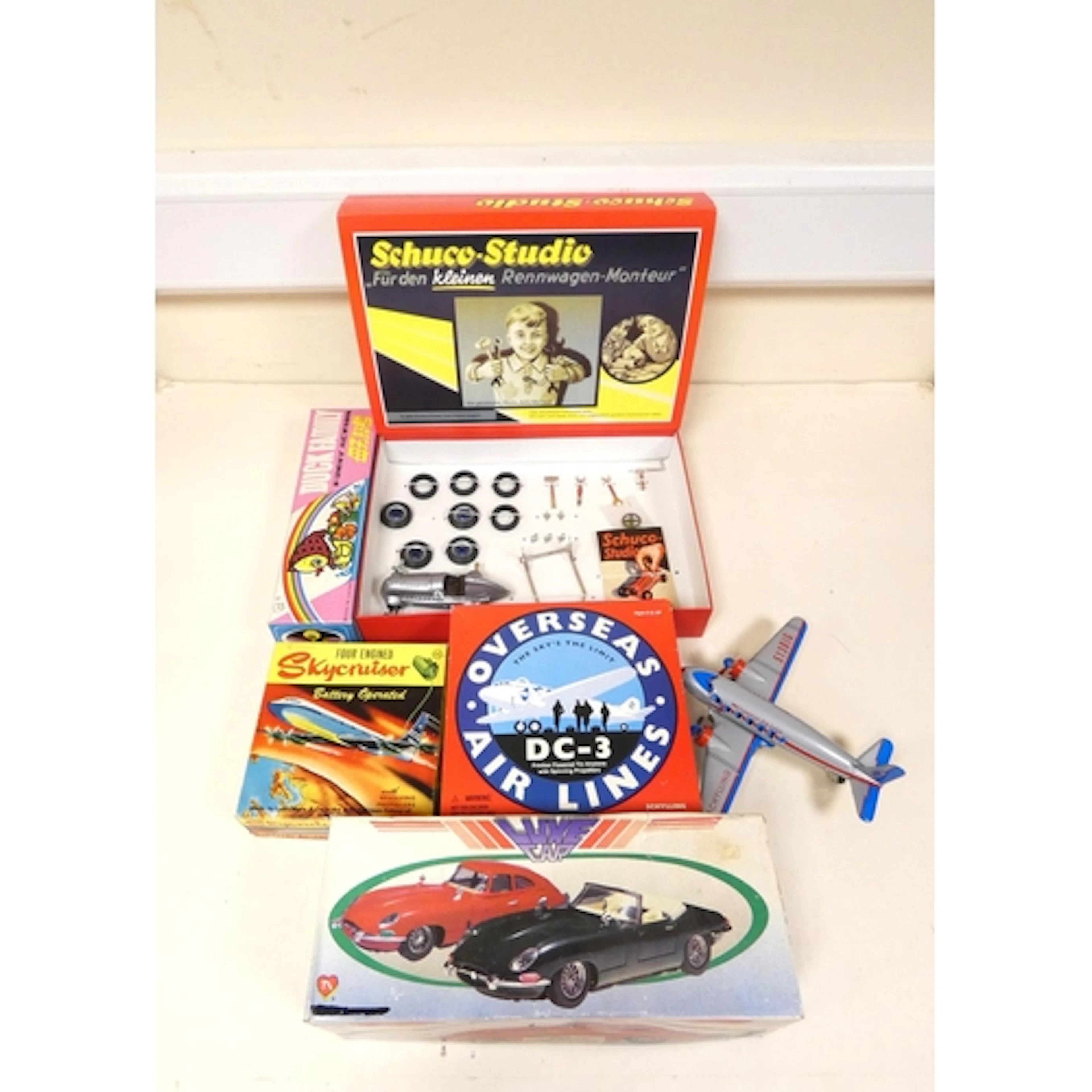 Group of boxed tin plate toys to include a re-issued Schuco ...