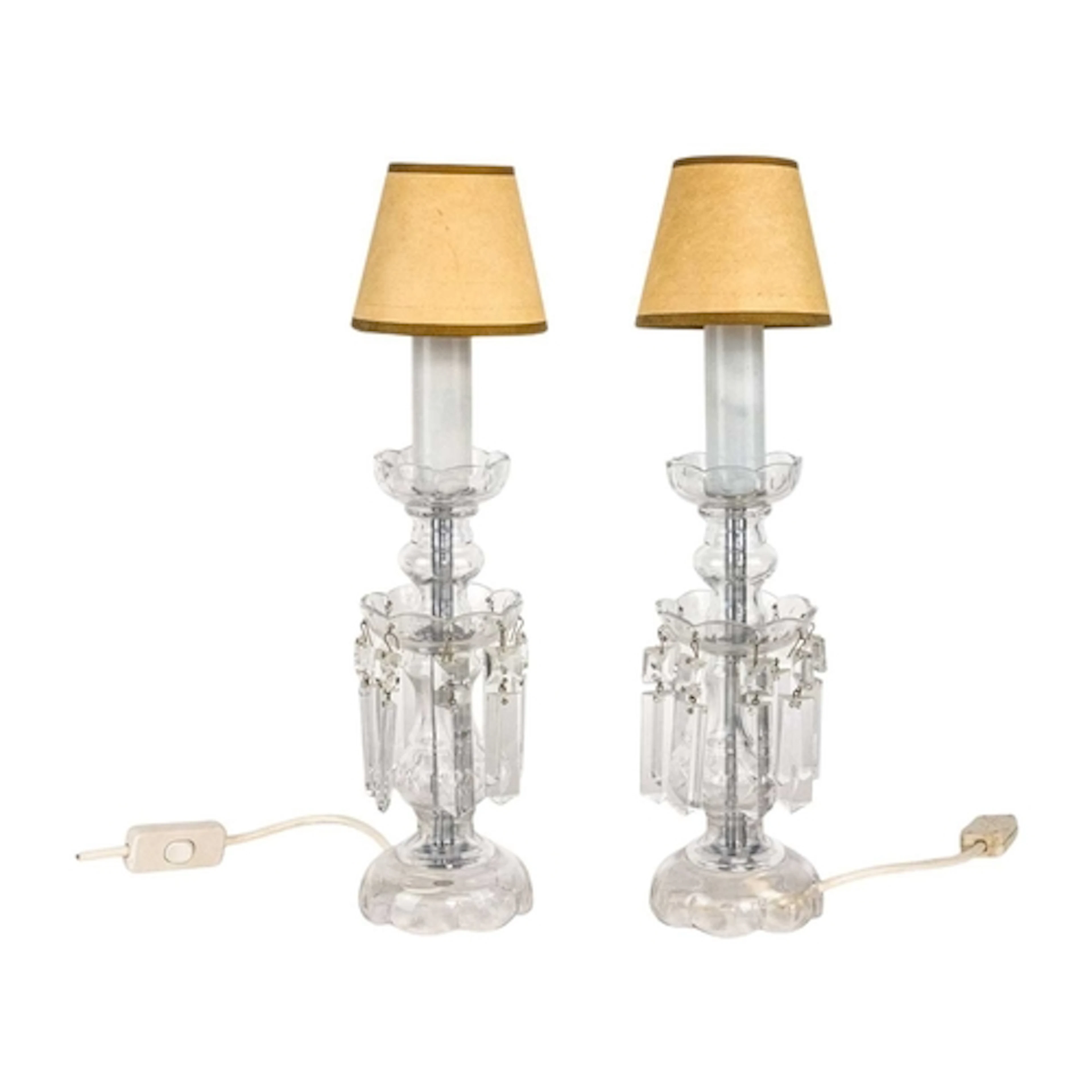 A pair of cut glass lustre table lamps. With dished stems an...