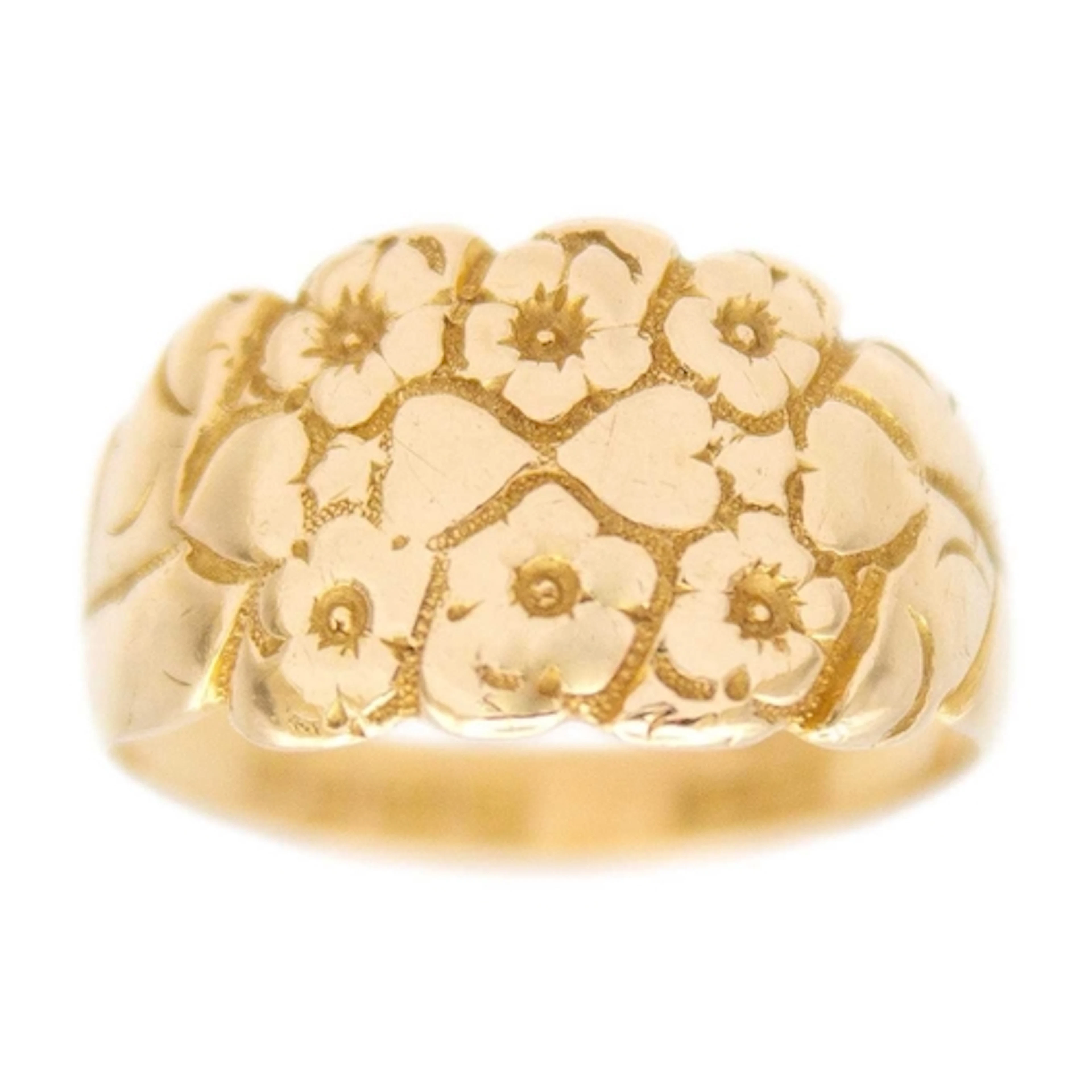 An early 20th-century 18k hallmarked gold ring, engraved wit...