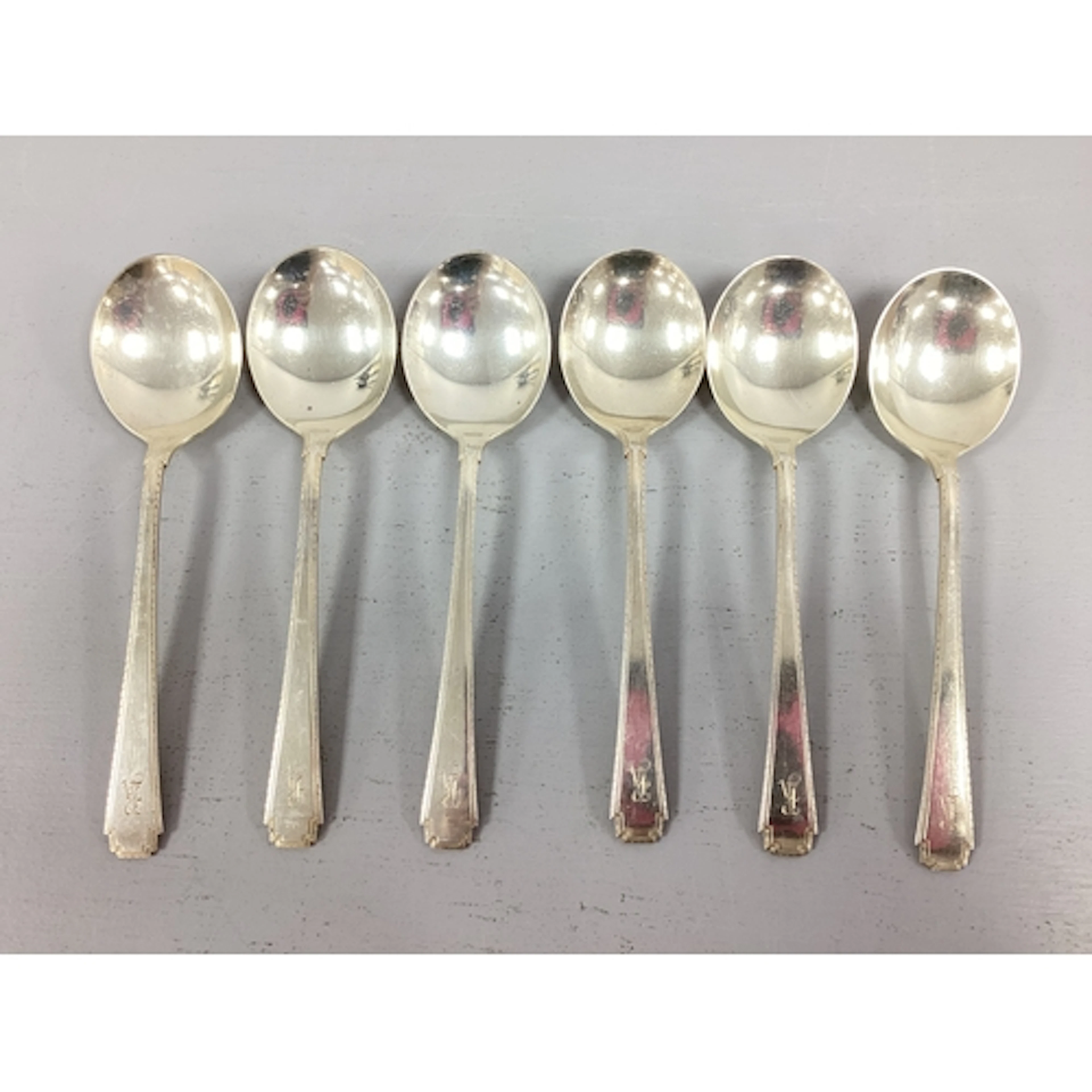 A Set of Six Wallace American Art Deco Style Soup Spoons, st...