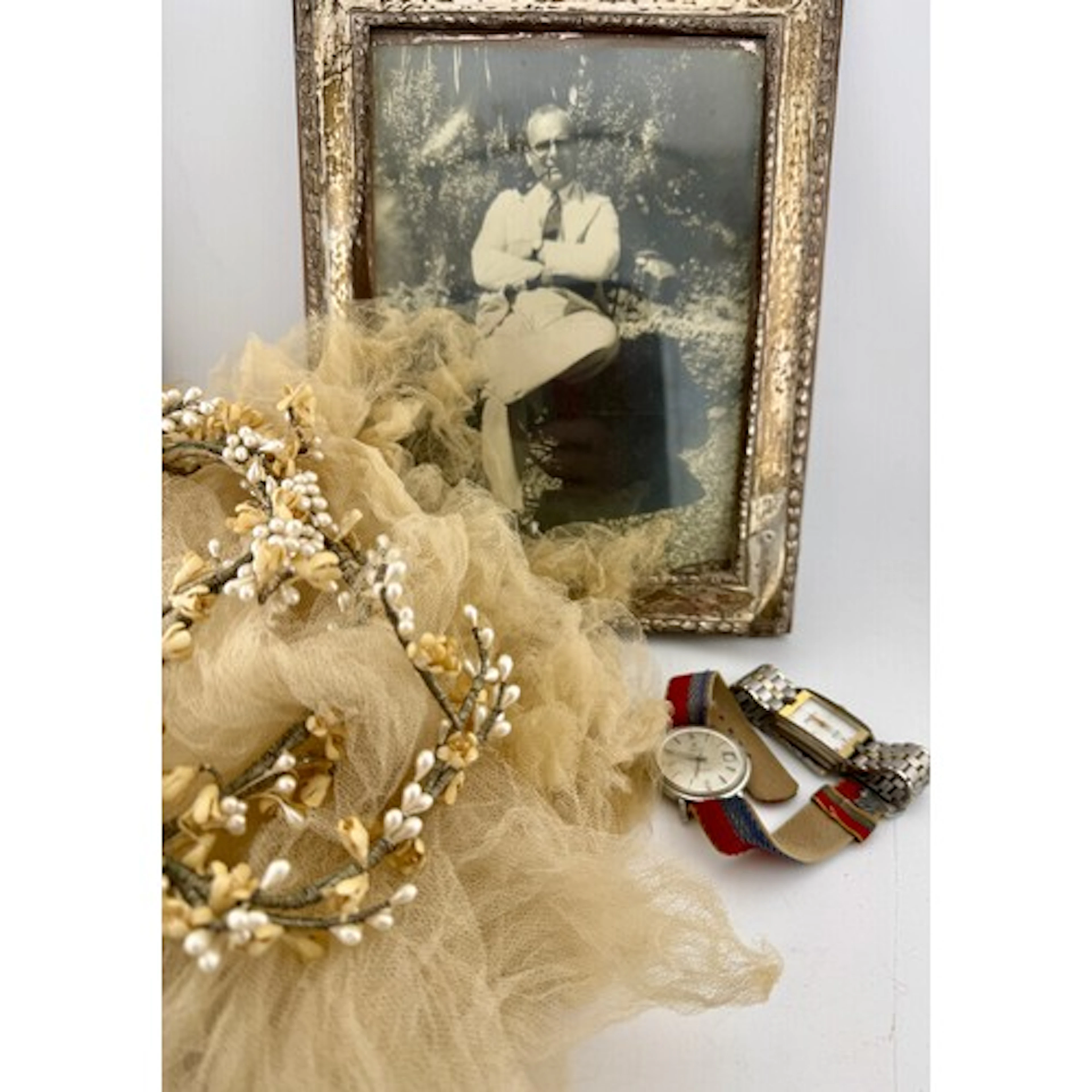 A miscellany to include vintage bridal veil with wax flowers...