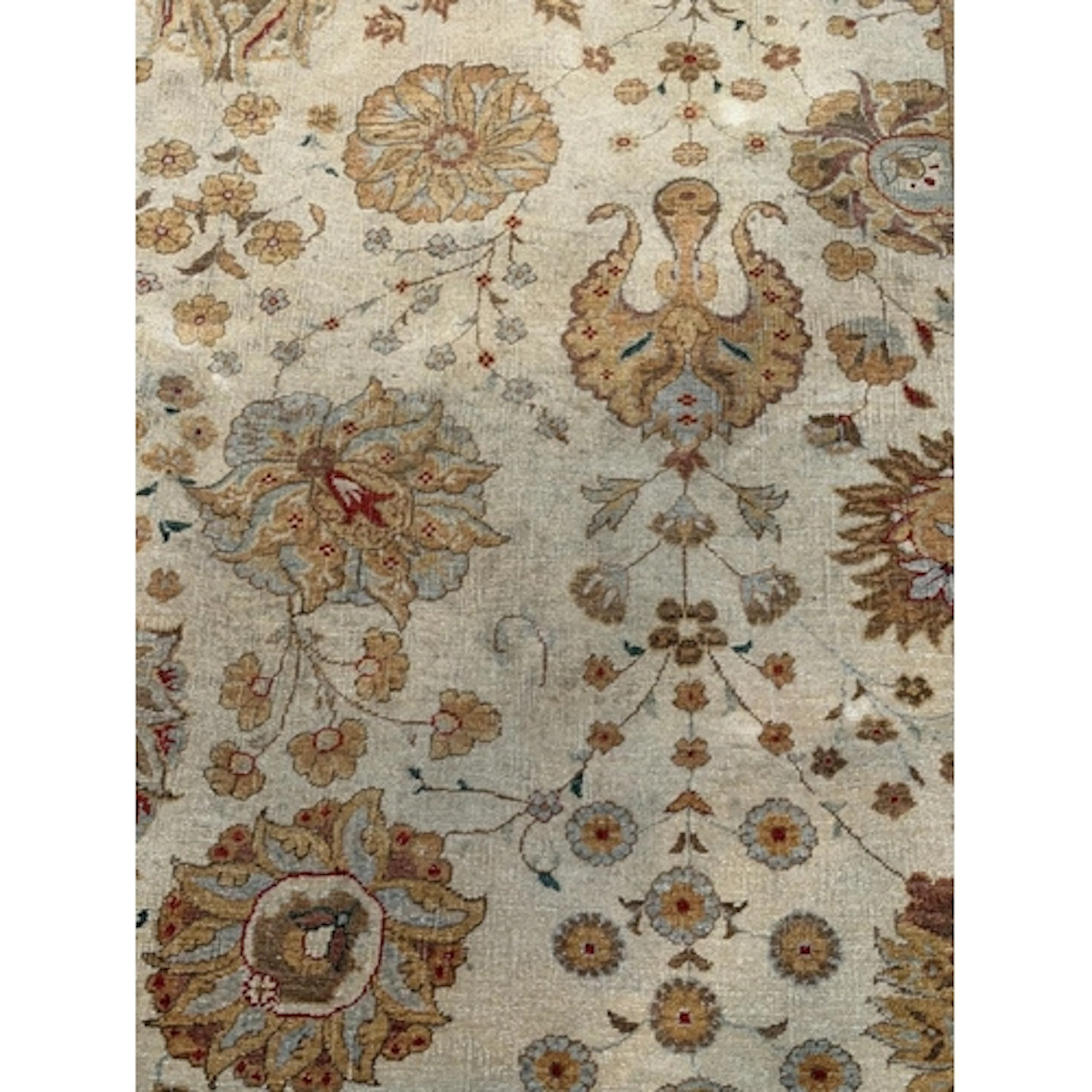 An Oriental Ziegler style rug with an all over floral patter...