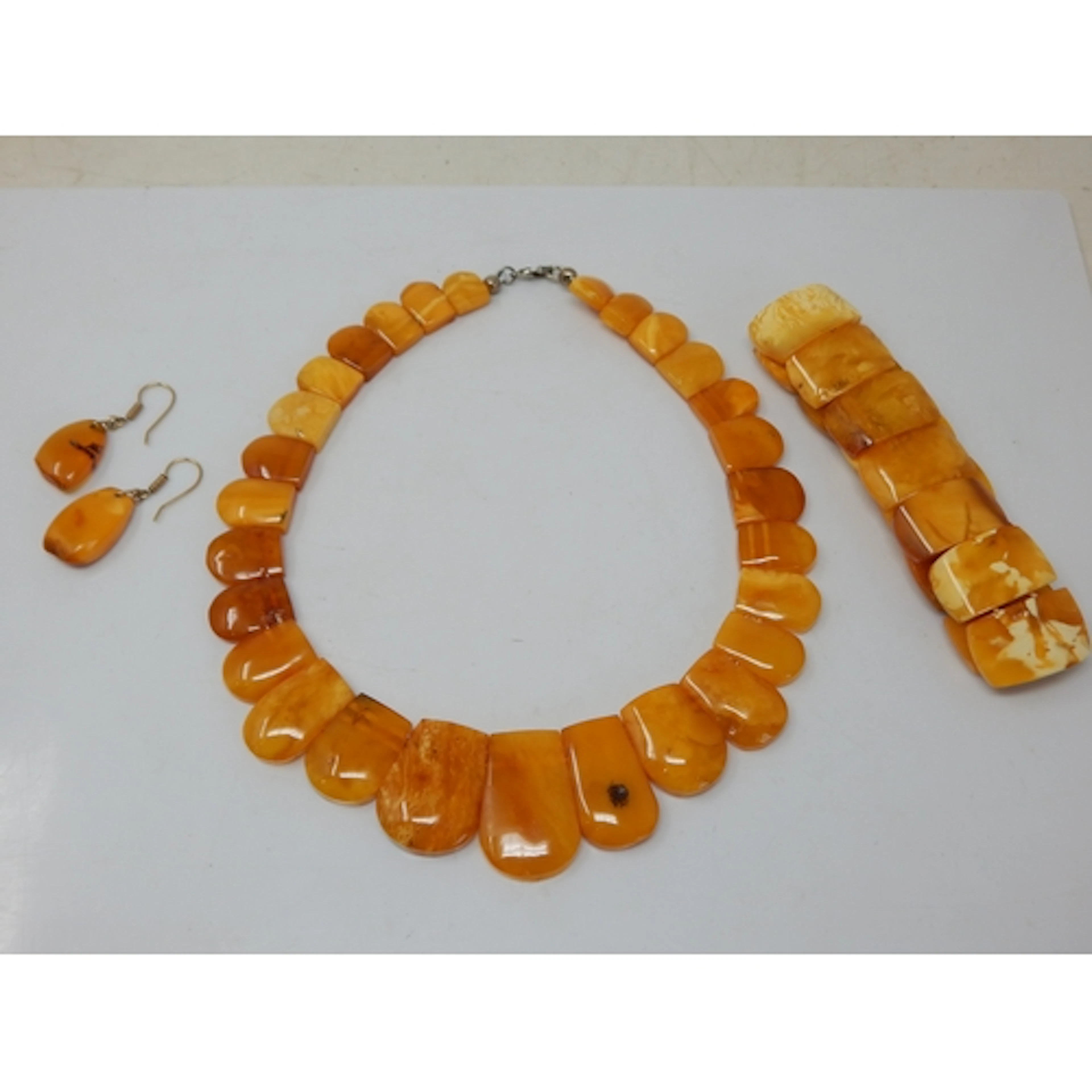 A Suite of Butterscotch Amber Jewellery Comprising Necklace,...