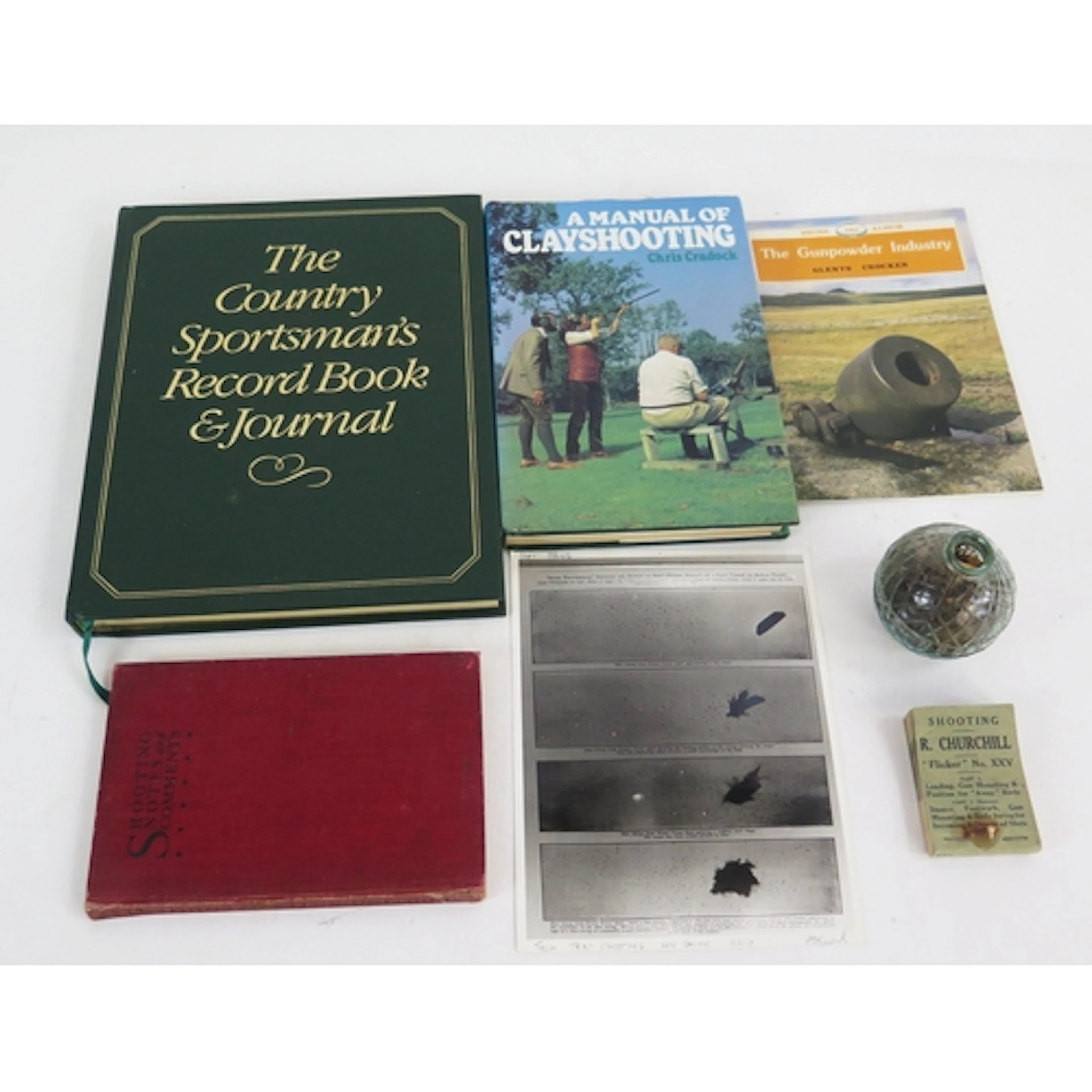A rare glass clay pigeon ball target by the N. B. Glassworks...