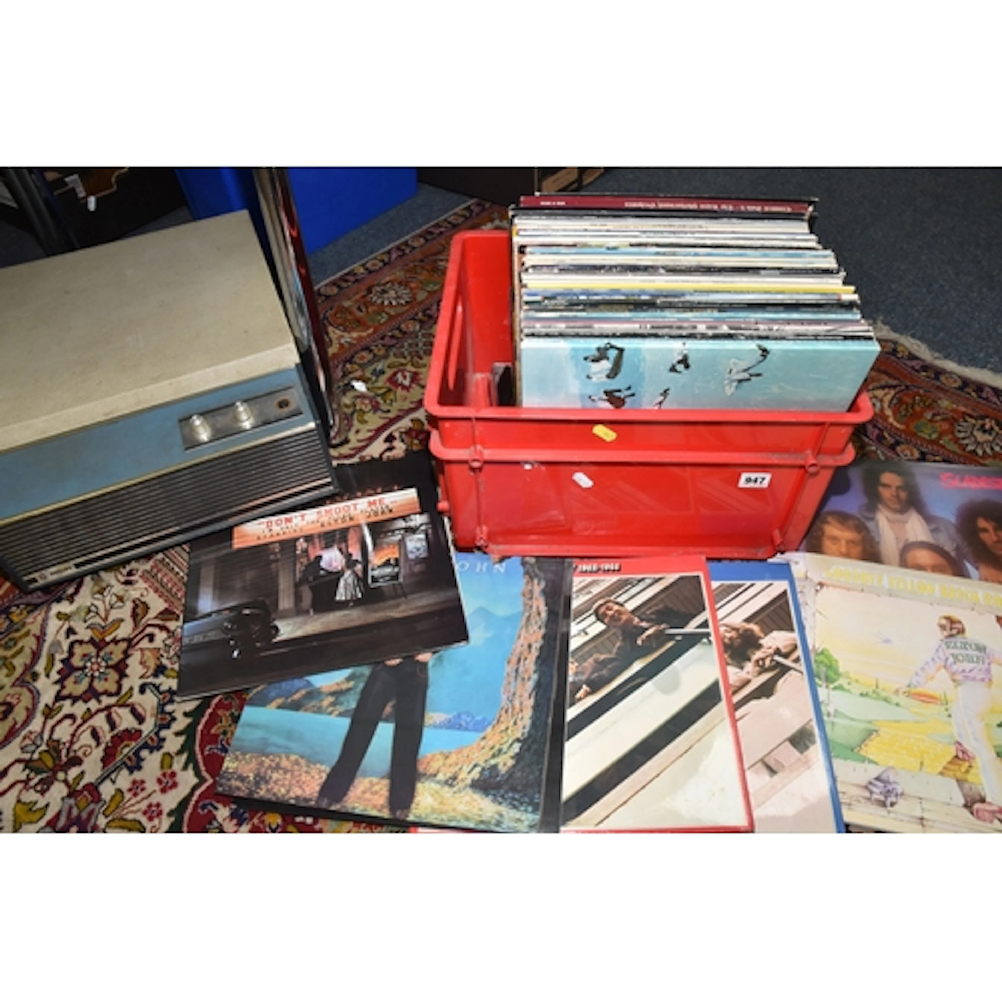TWO BOXES OF RECORDS AND A PLAYER to include a box of LPs to...