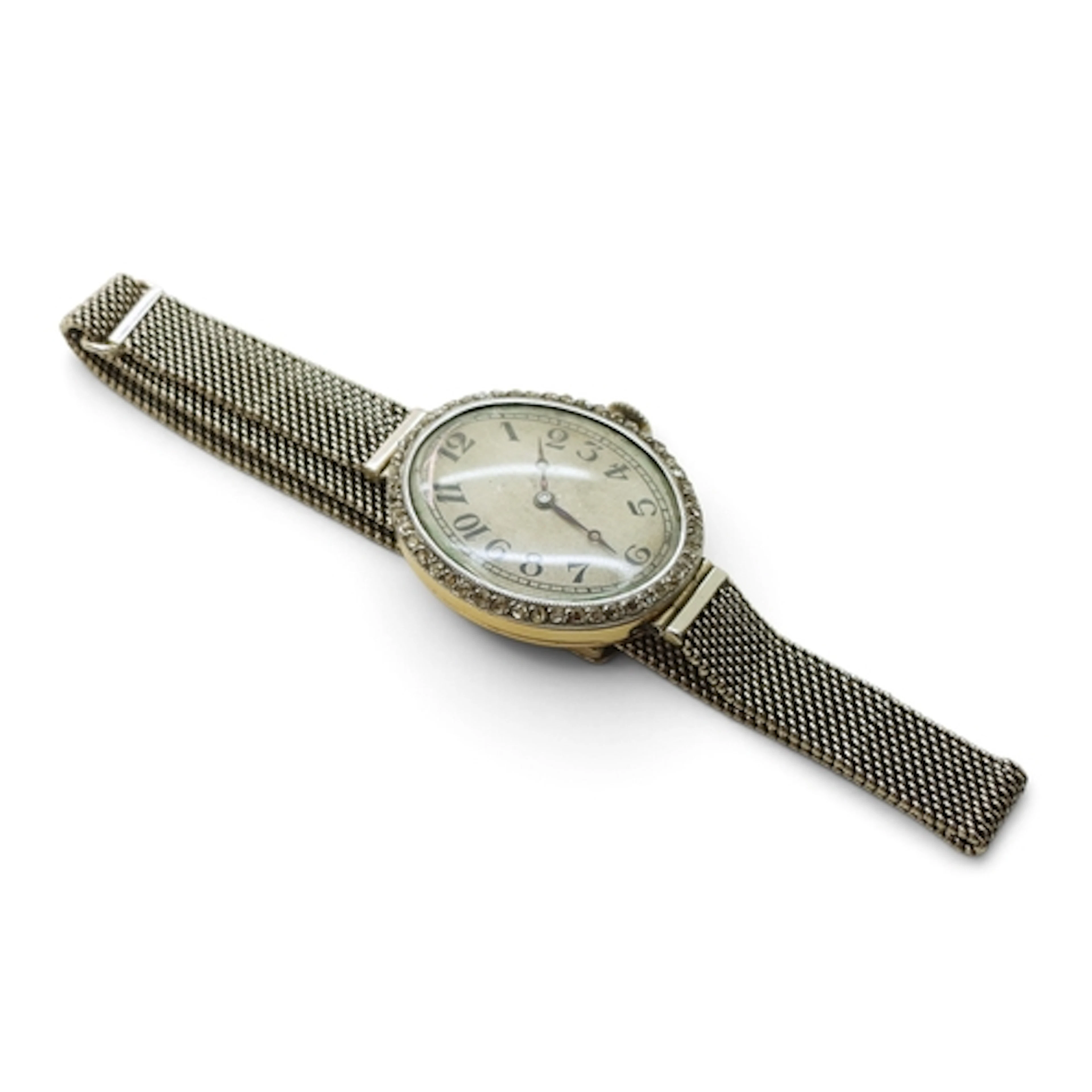 A DIAMOND COCKTAIL WATCH with a 9ct white gold strap. Silver...