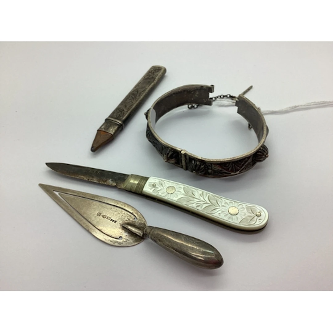 A Novelty Hallmarked Silver Trowel Bookmark, together with a...