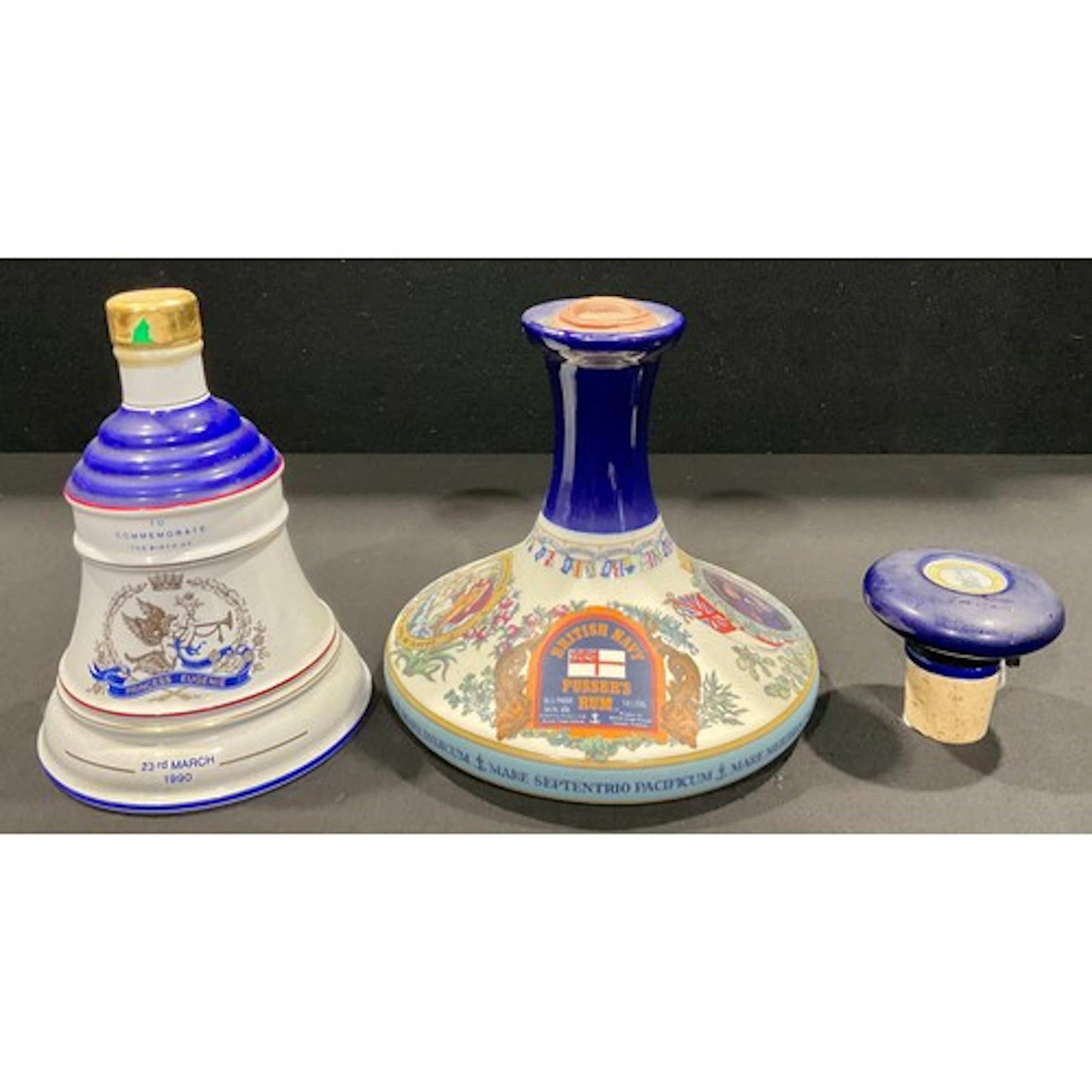 A porcelain commemorative decanter of British Navy Pusser’s ...